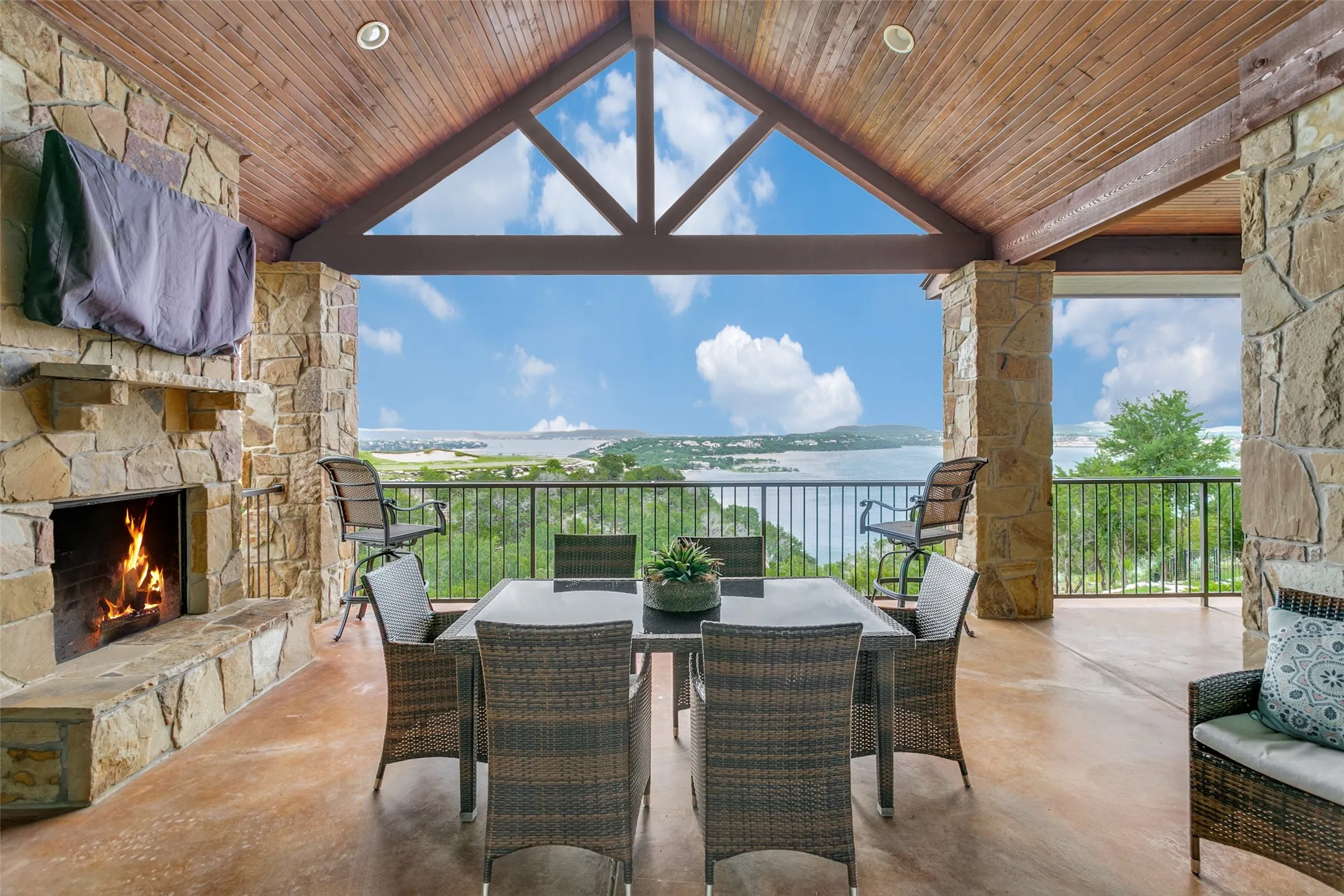 Balcony on main floor with lake and golf course view