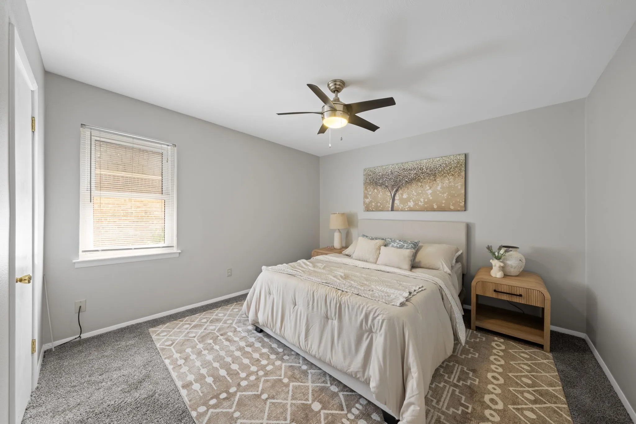 Neutral wall tones with carpeted flooring