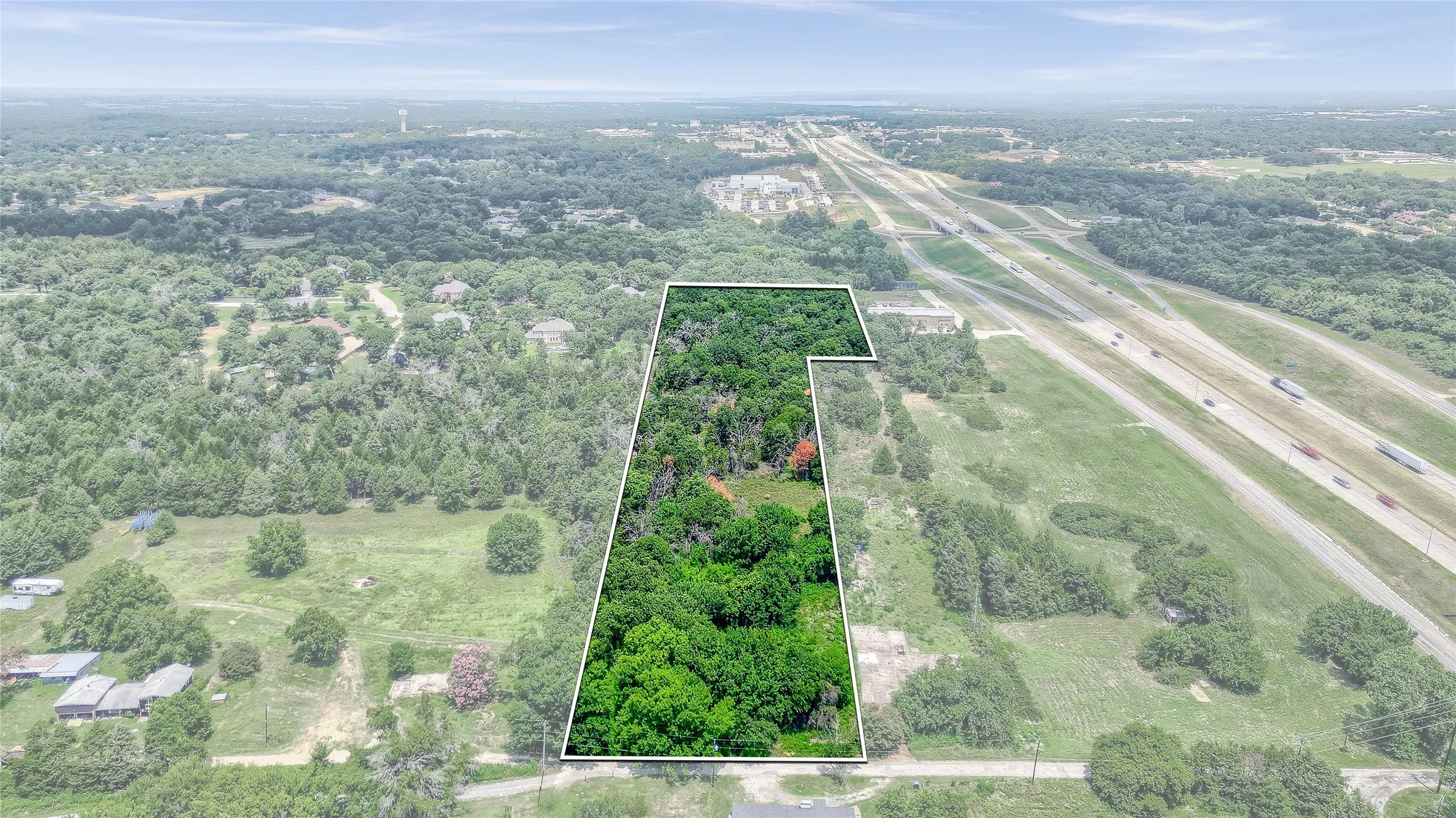 Expansive wooded parcel featuring mature trees