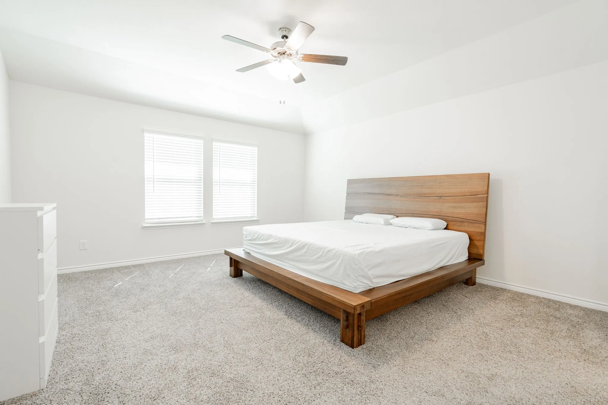 Vaulted ceiling with an attached ceiling fan
