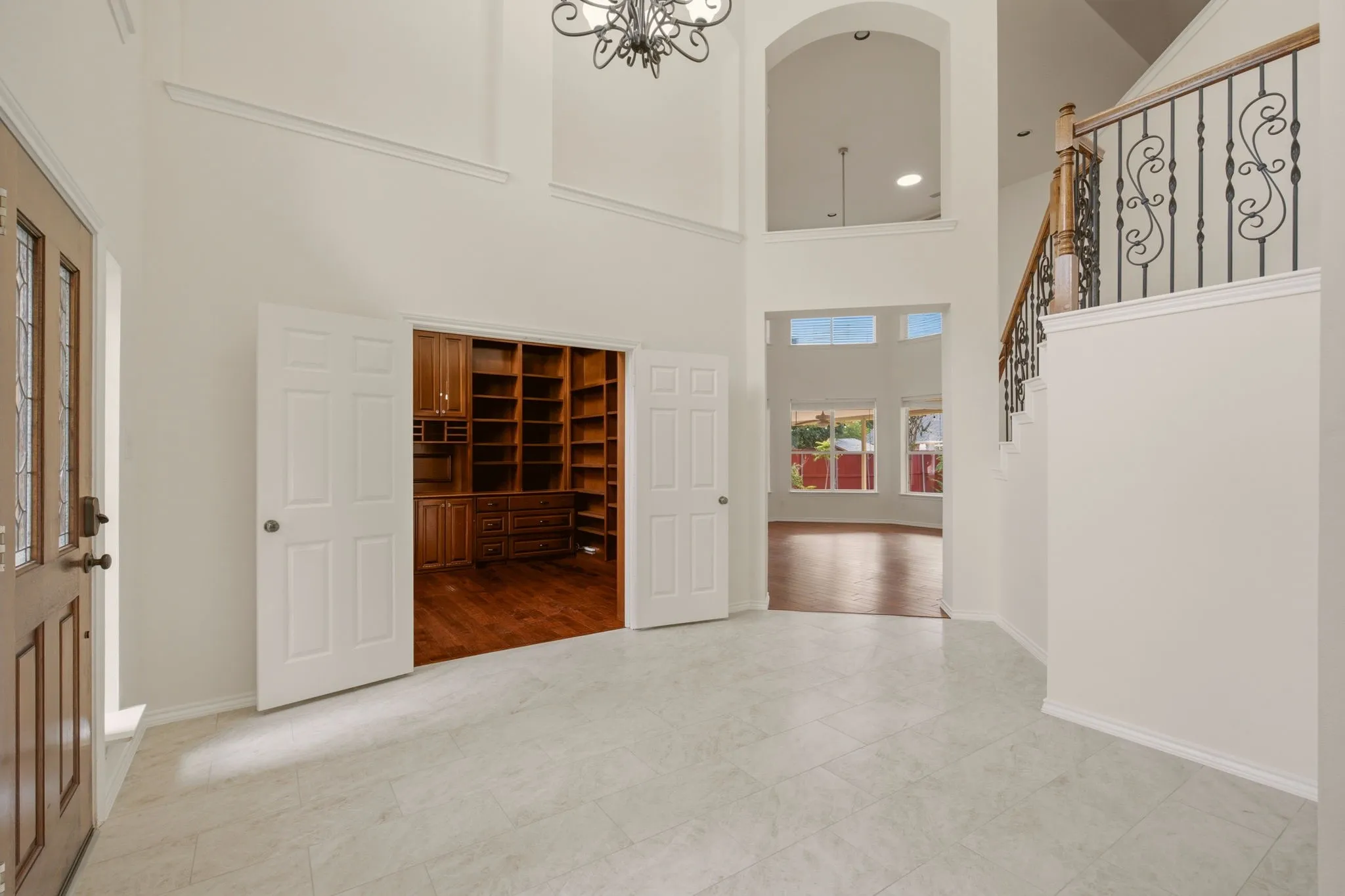 2-story grand entry. Study to the left, formal dining right.