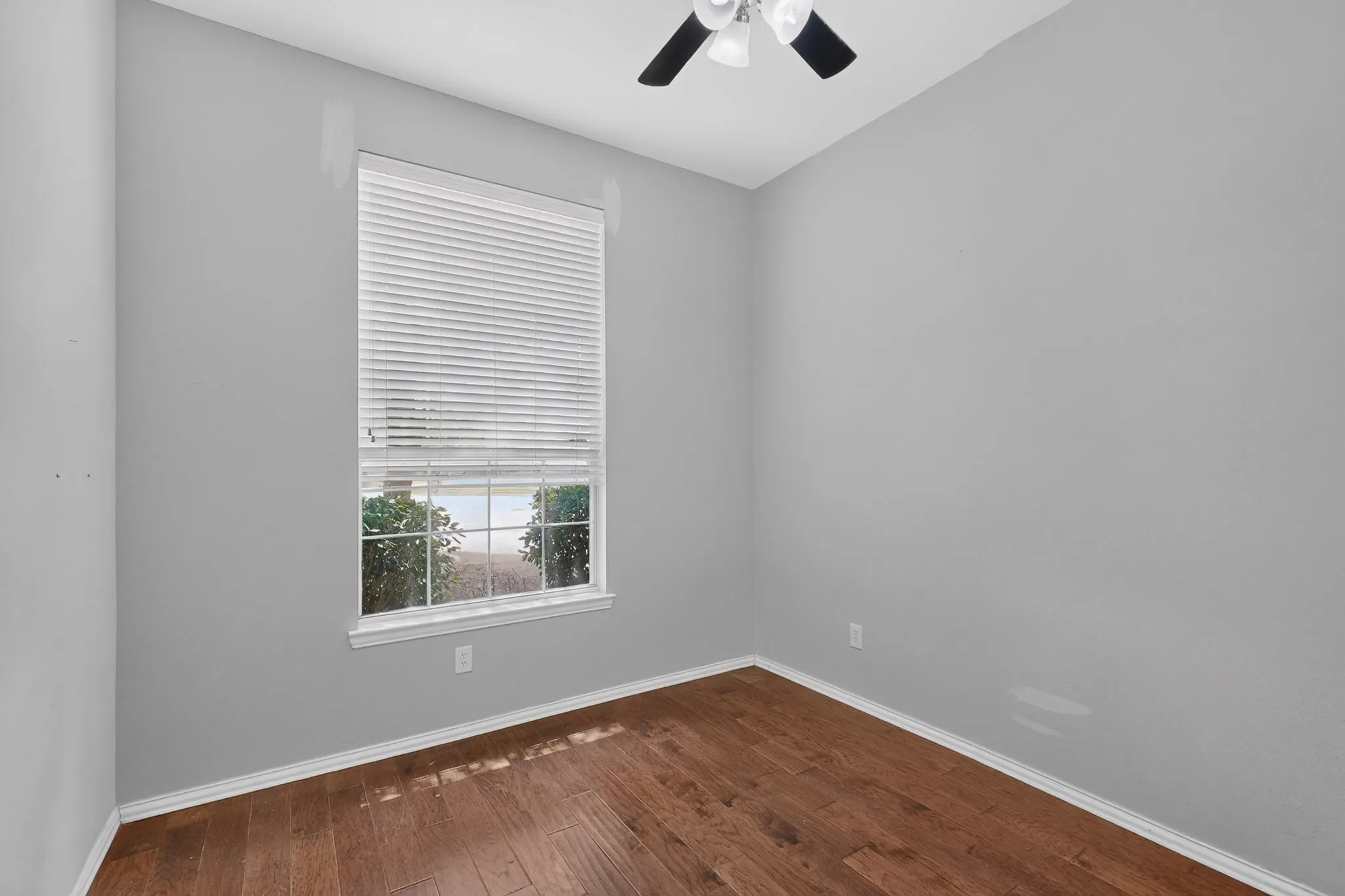 Wood-finish flooring with white trim