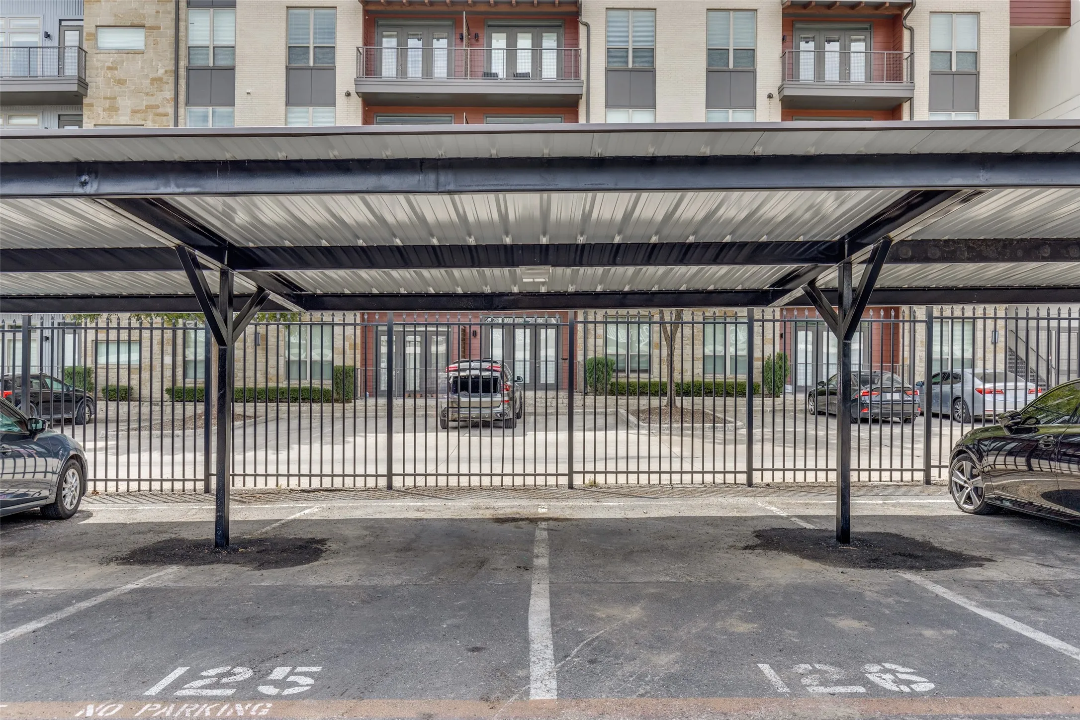 2 Designated Covered Parking Spots