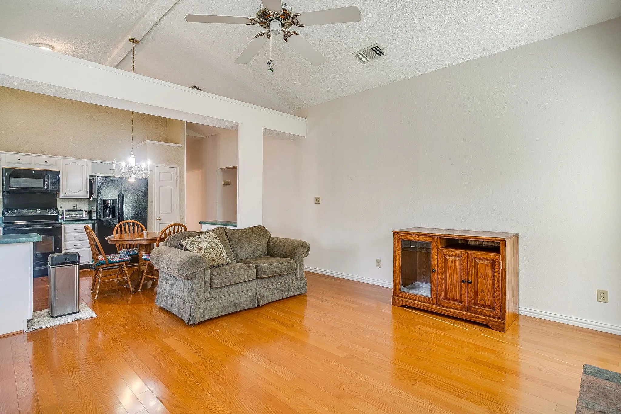 Open concept living/dining/kitchen space.