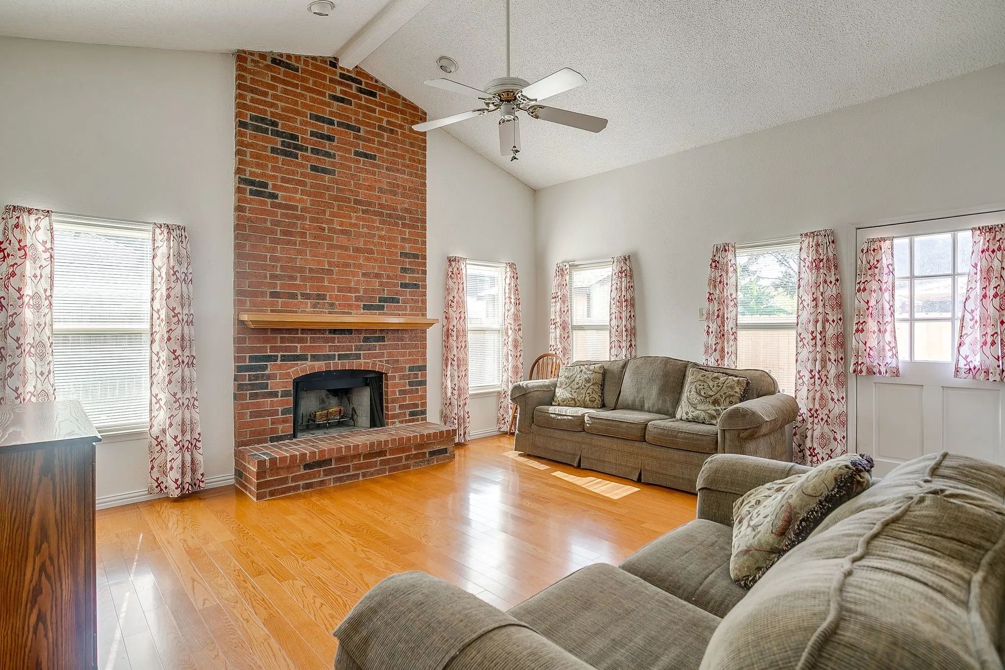 Spacious living room with tons of natural light.