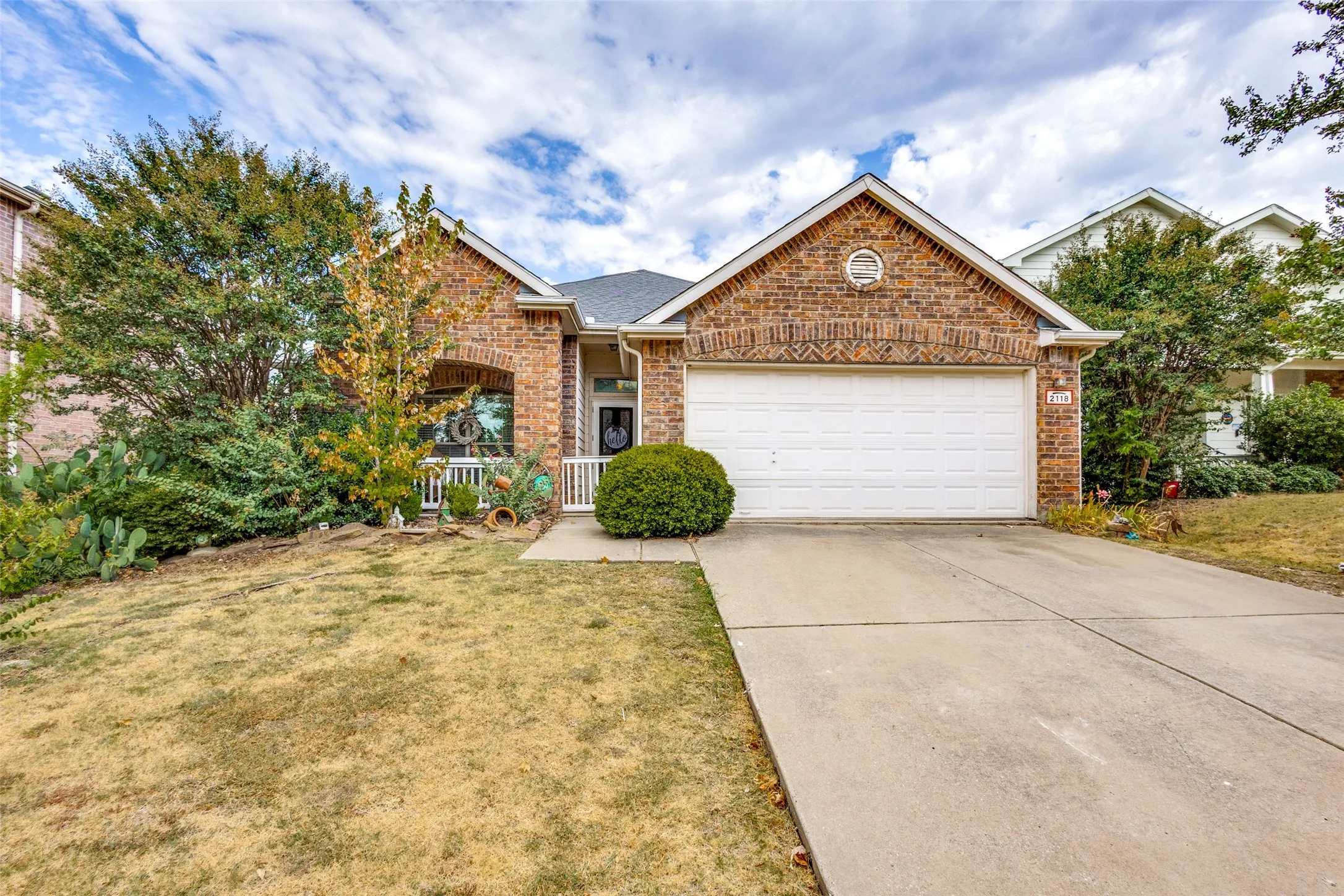 Brick exterior with arched entry. Wonderful size front porch.