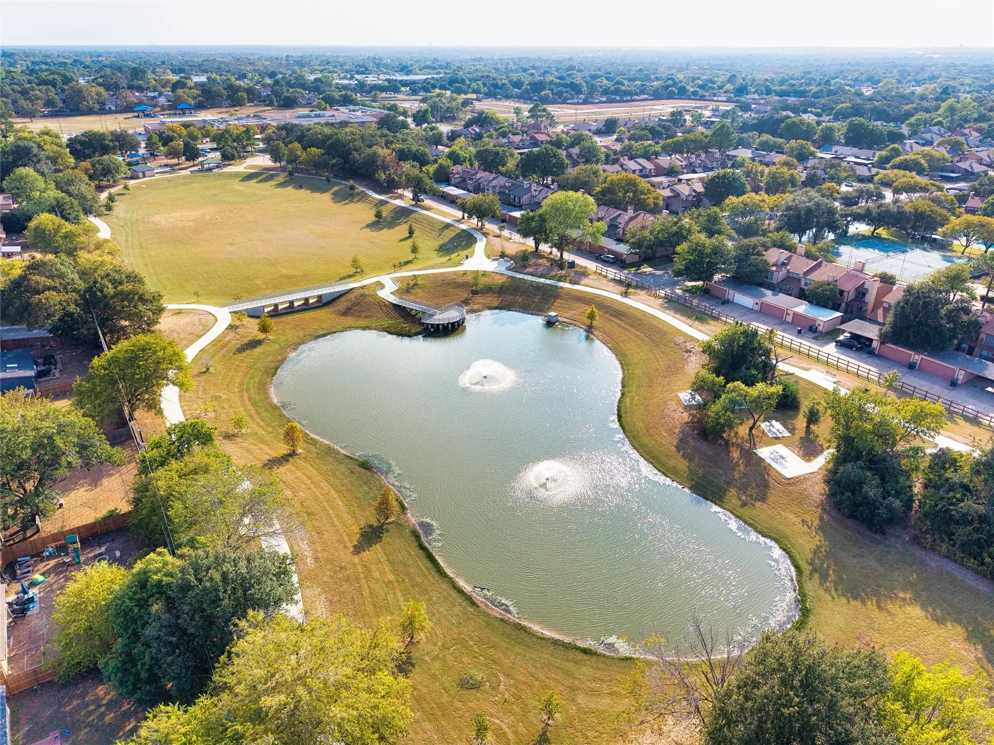 peaceful walking trails pond with water feature included