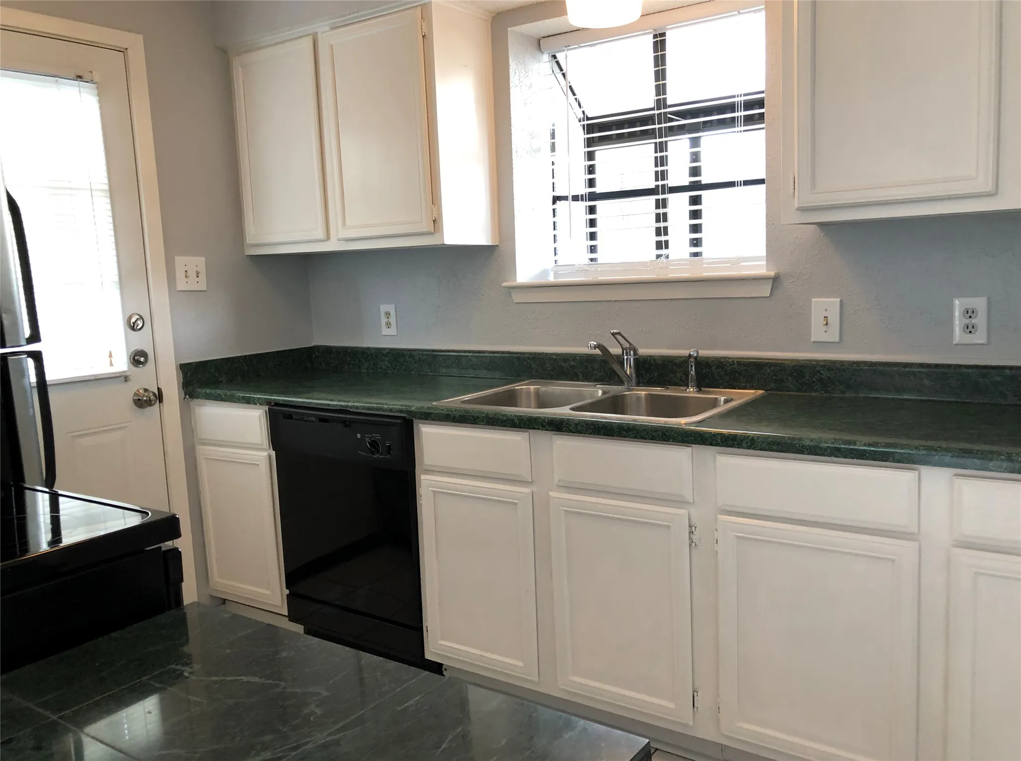 Galley kitchen with nearly new range