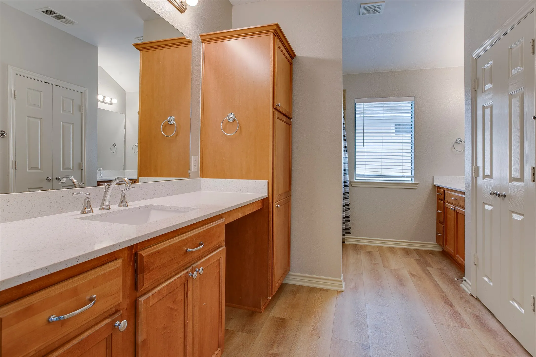 Primary with quartz counters, dual sinks and large tub-shower combo