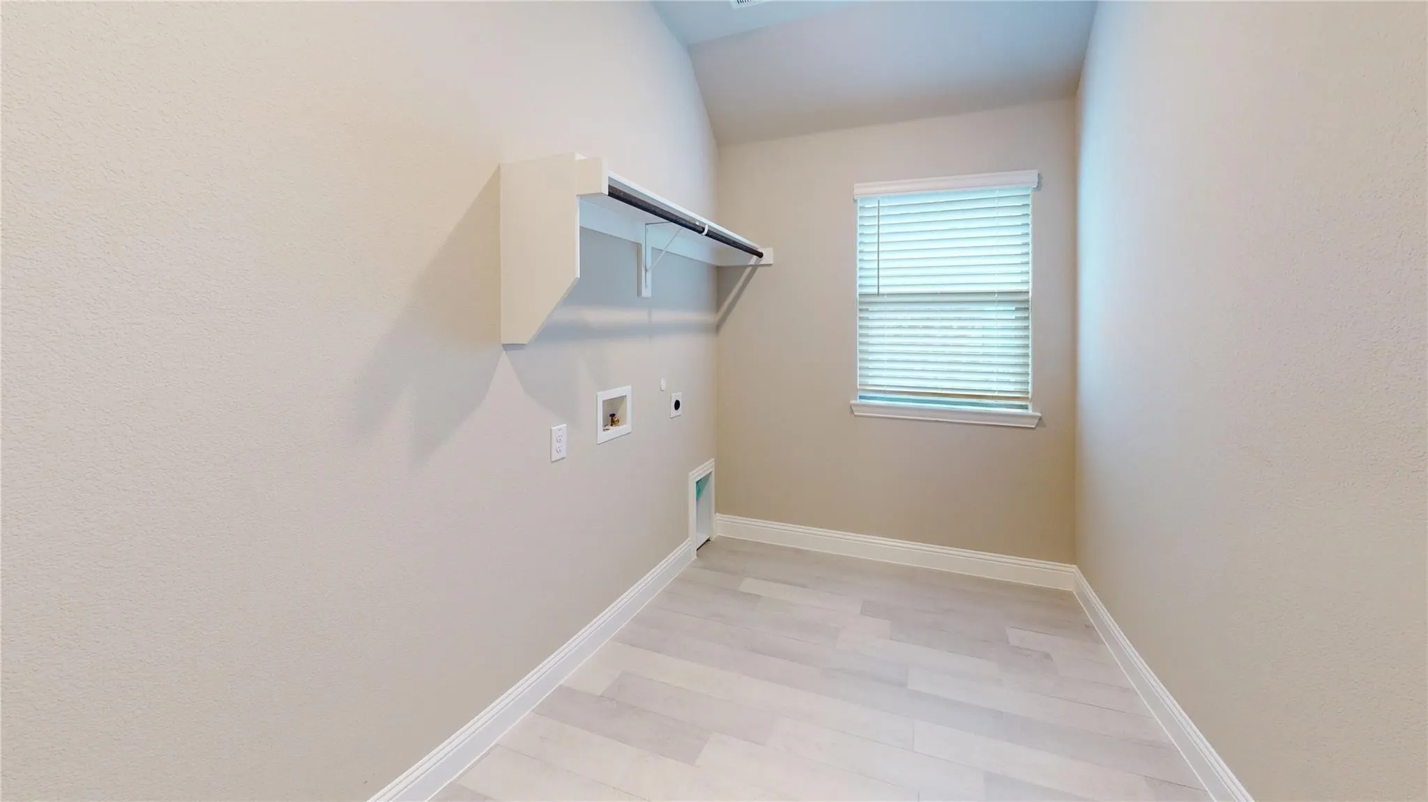 Window with blinds, light-toned walls, and wood-finish​​‌​​​​‌​​‌‌​‌‌​​​‌‌​‌​‌​‌​​​‌​​ flooring