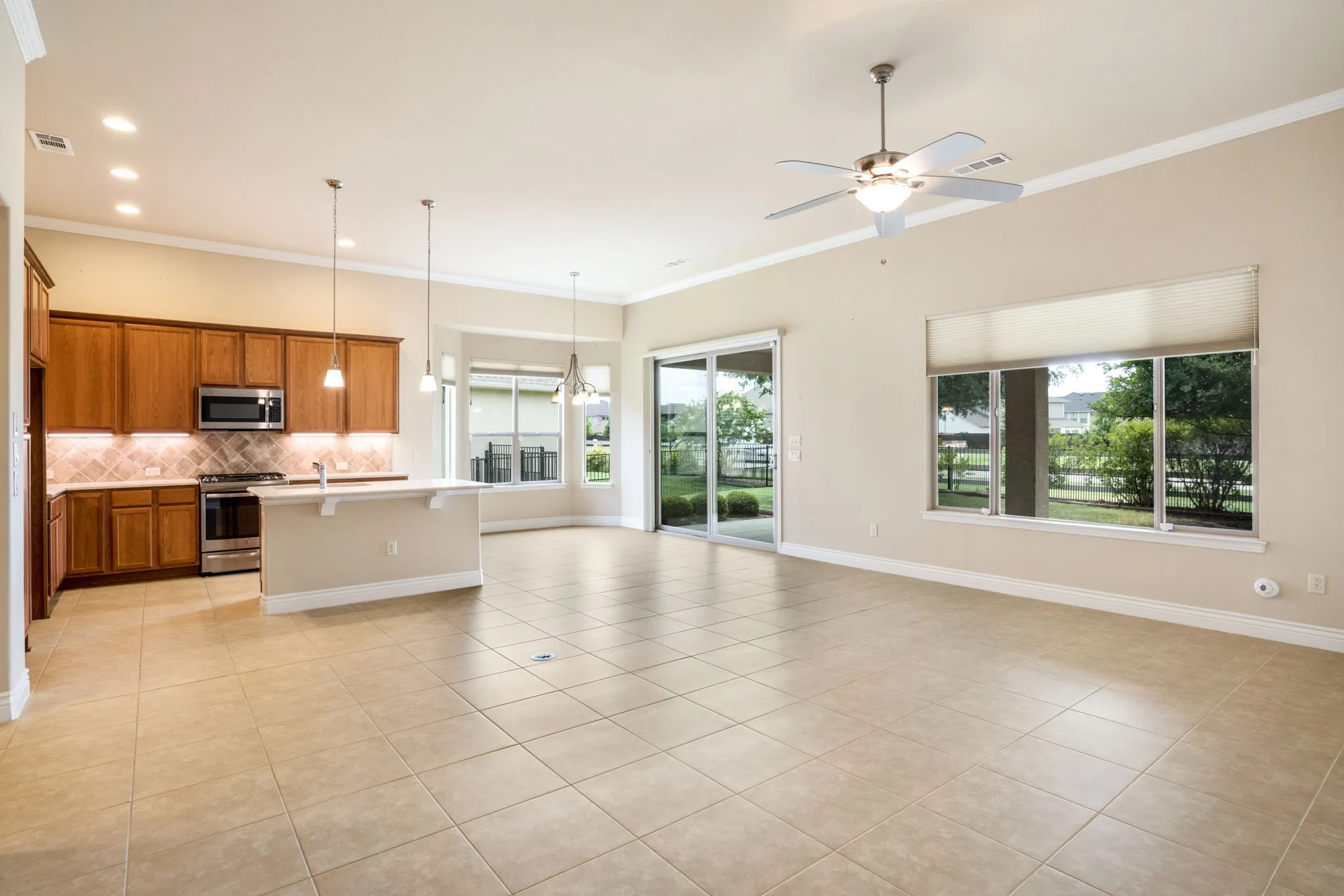 Living dining and kitchen are open and bright