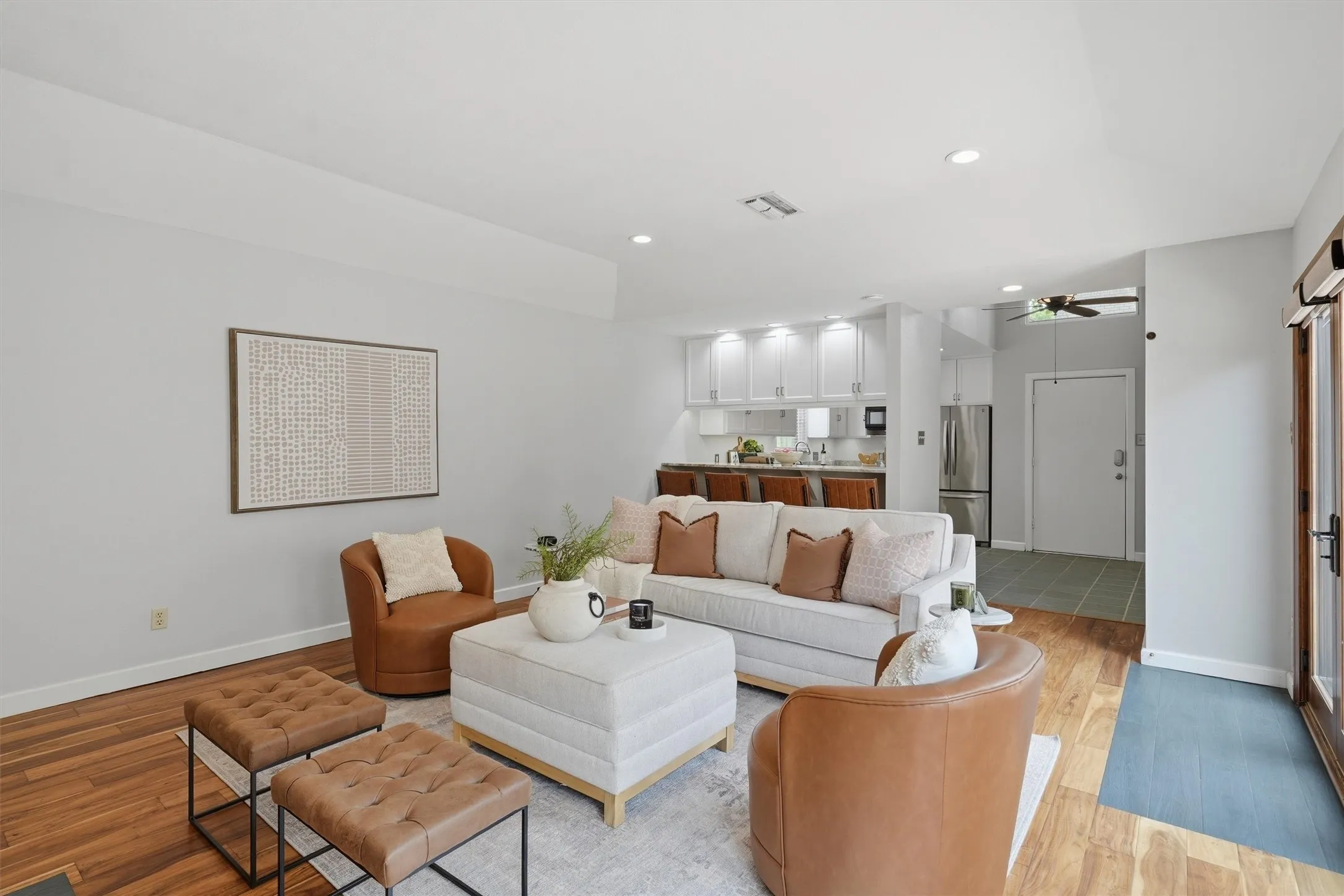 Seamless flow from entry way, to living room.