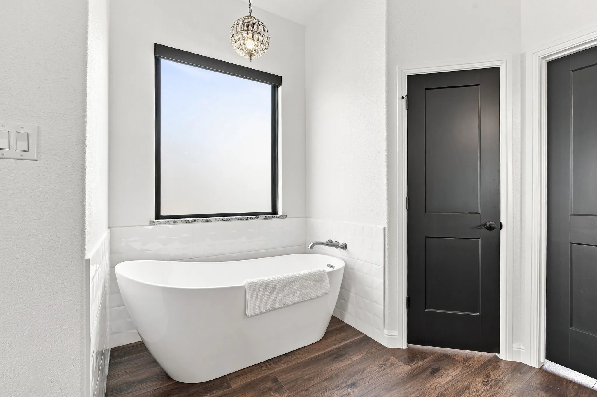 Bright primary bathroom with seperate garden tub!