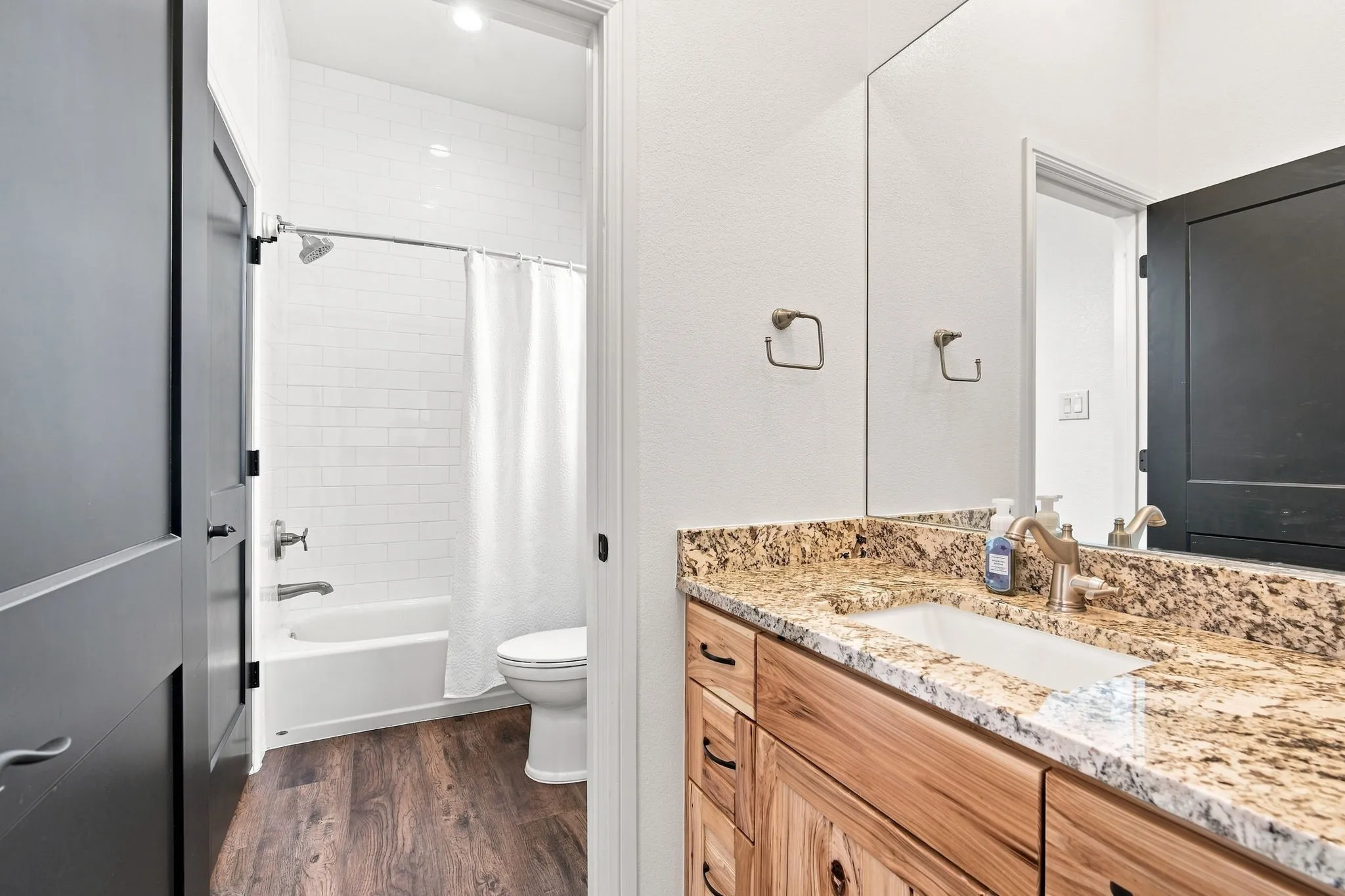 Bright guest bathroom with spacious layout.
