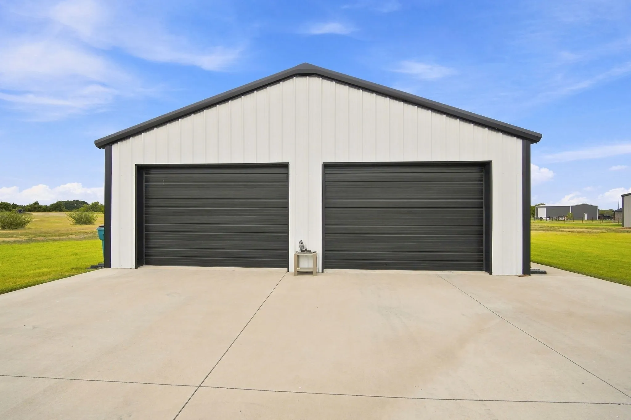 Detached garage with climate control and bathroom.