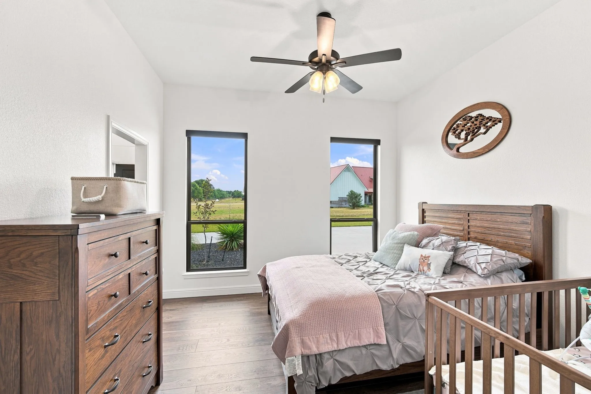 Spacious bedroom with natural lighting and inviting feel.