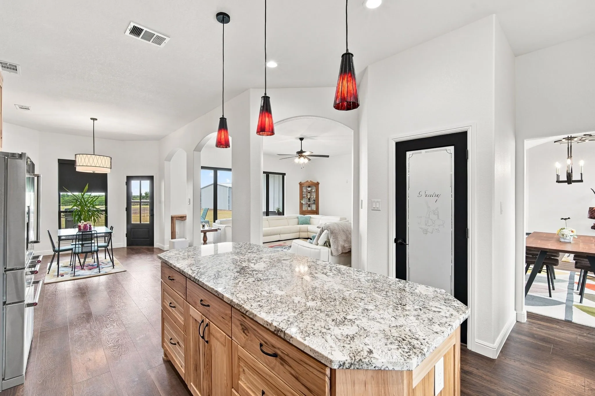 Functional kitchen with plenty of storage and prep space, including oversized island.