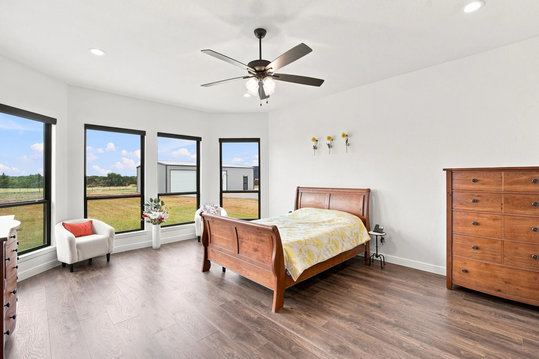 Grand primary suite offering abundant natural light, space and a private retreat.