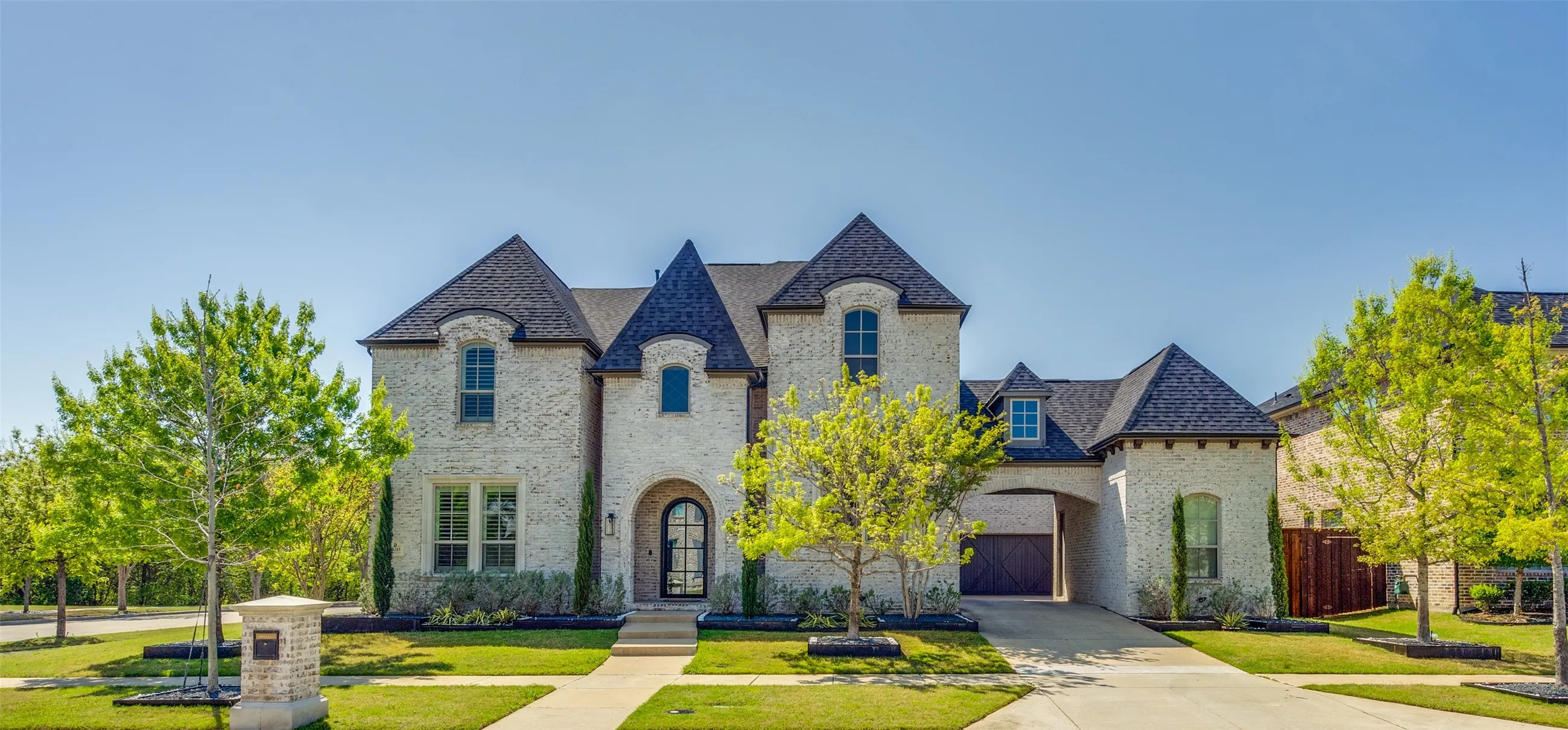 Custom 4,931 square foot home on a corner lot in gated Shaddock Creek Estates in Frisco, Texas