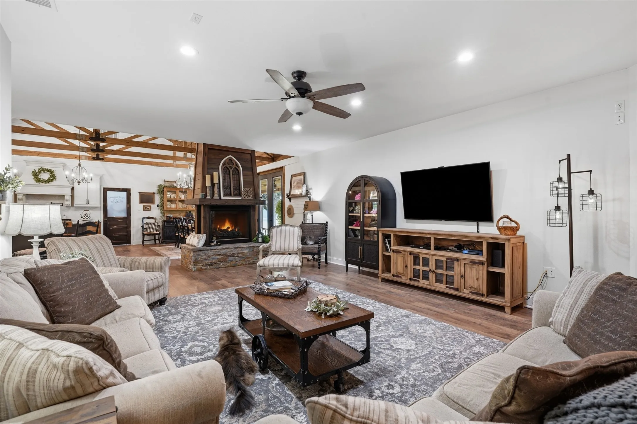 family room open to enormous kitchen area and see thru fireplace