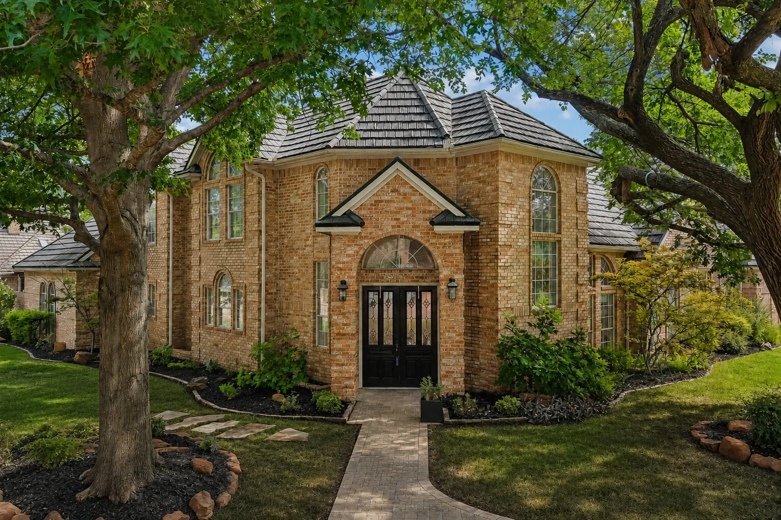 Brick exterior with stone accents and a multi-gabled roof. Enhanced with AI