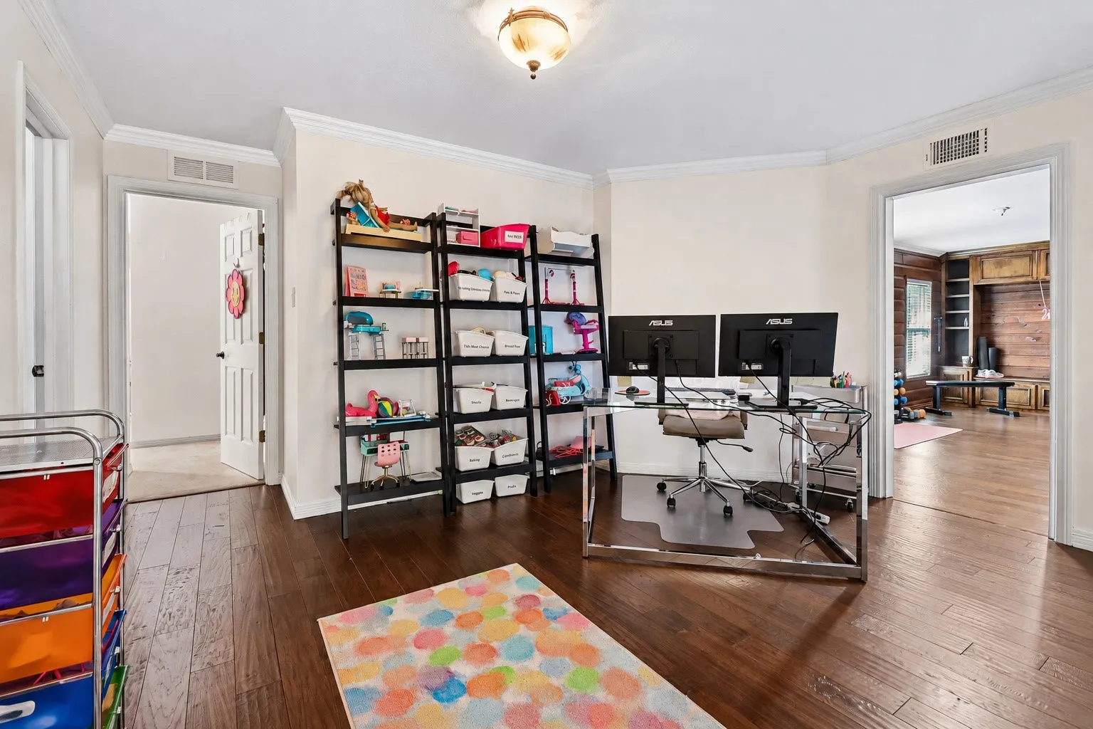 Hardwood-finish flooring, crown molding, and recessed lighting