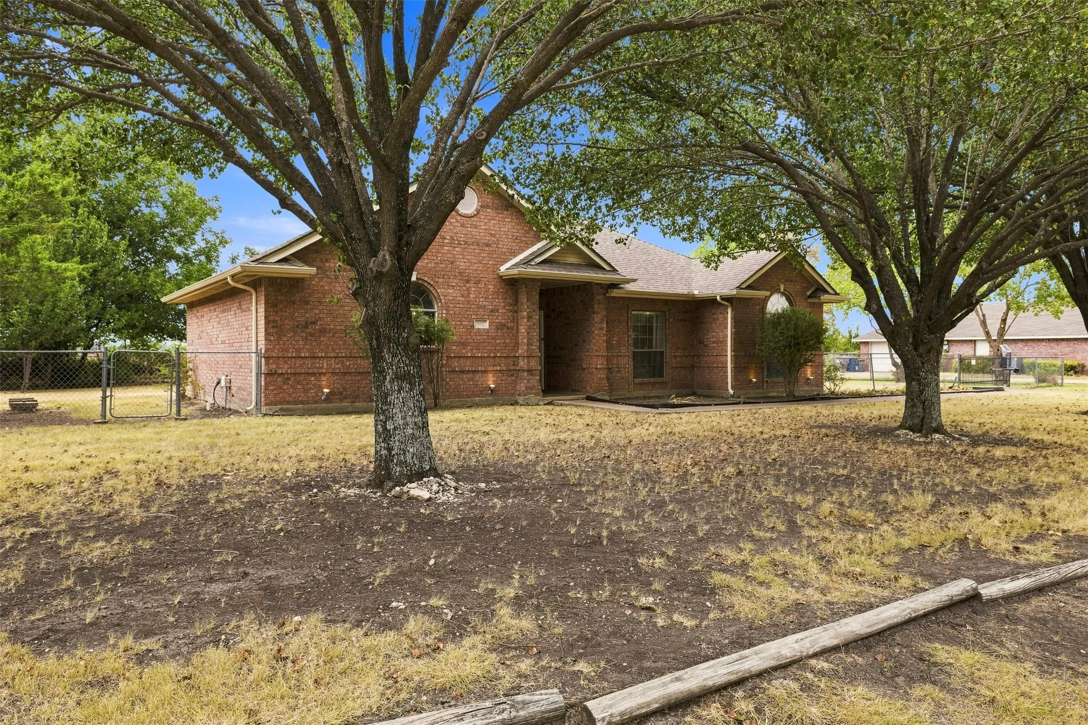 The living room allows easy access to the kitchen and dining area.
