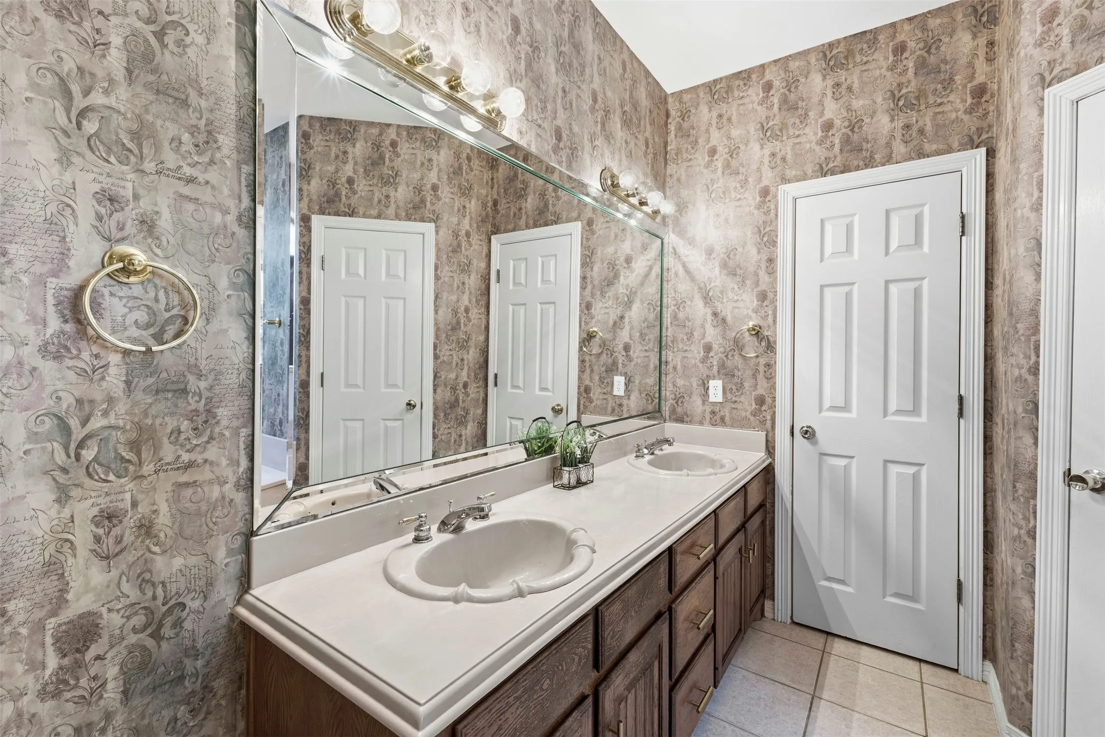 Primary bath has a beautiful soaking tub, and double sinks.