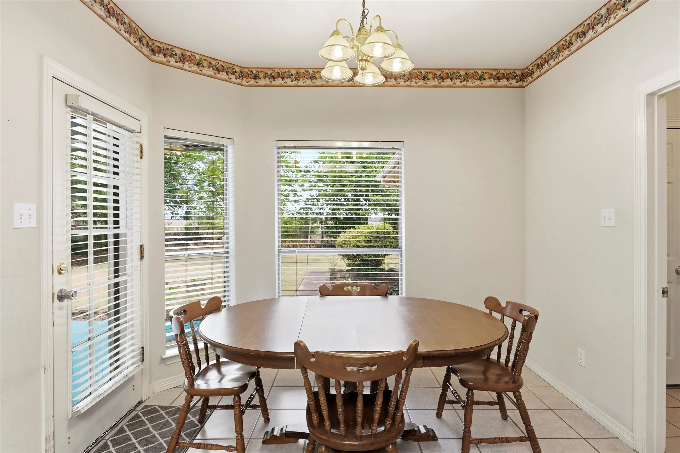 Kitchen has easy access to the outside.