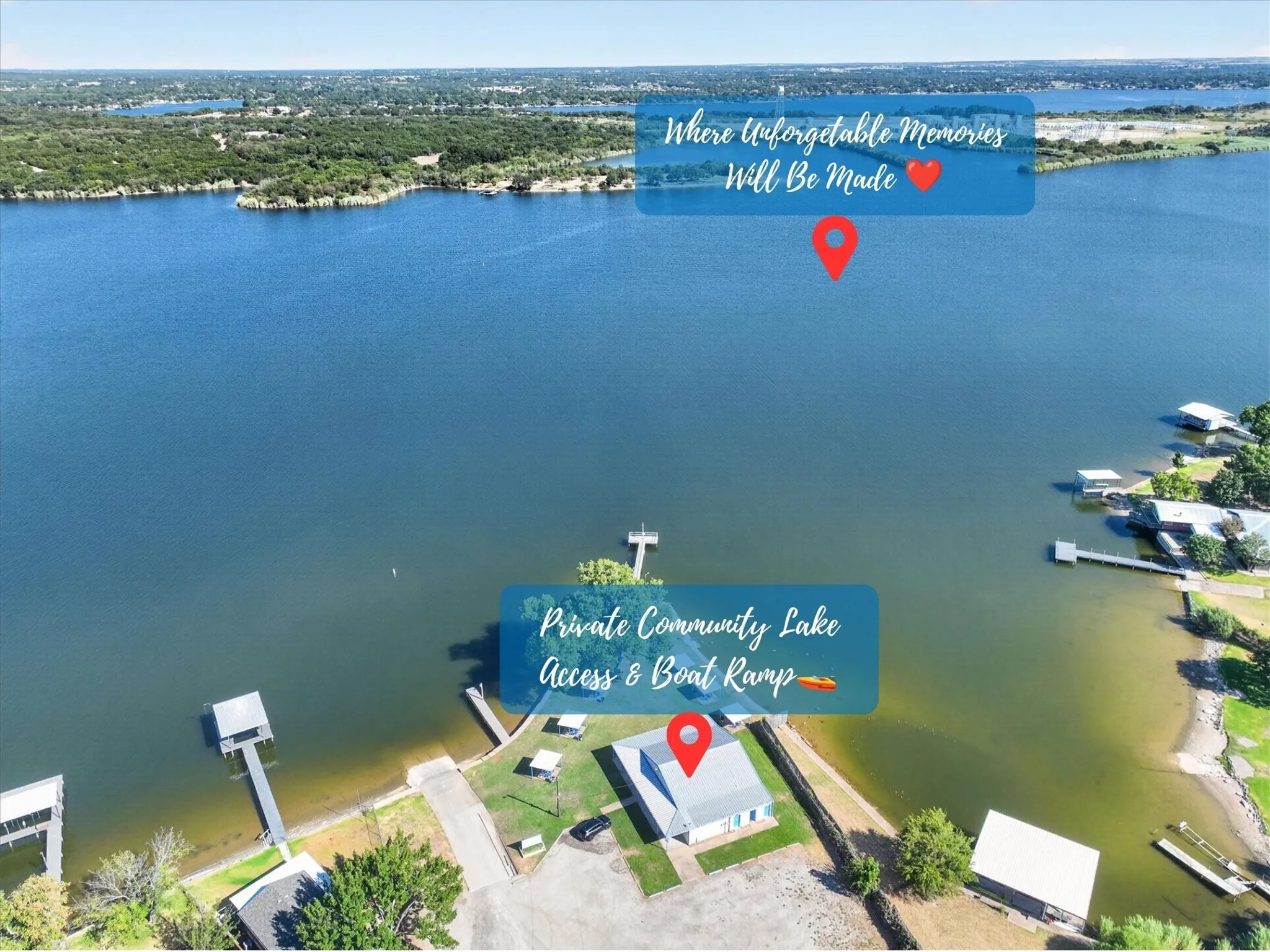 Lakefront property with multiple boat docks, a boat ramp, and expansive water frontage
