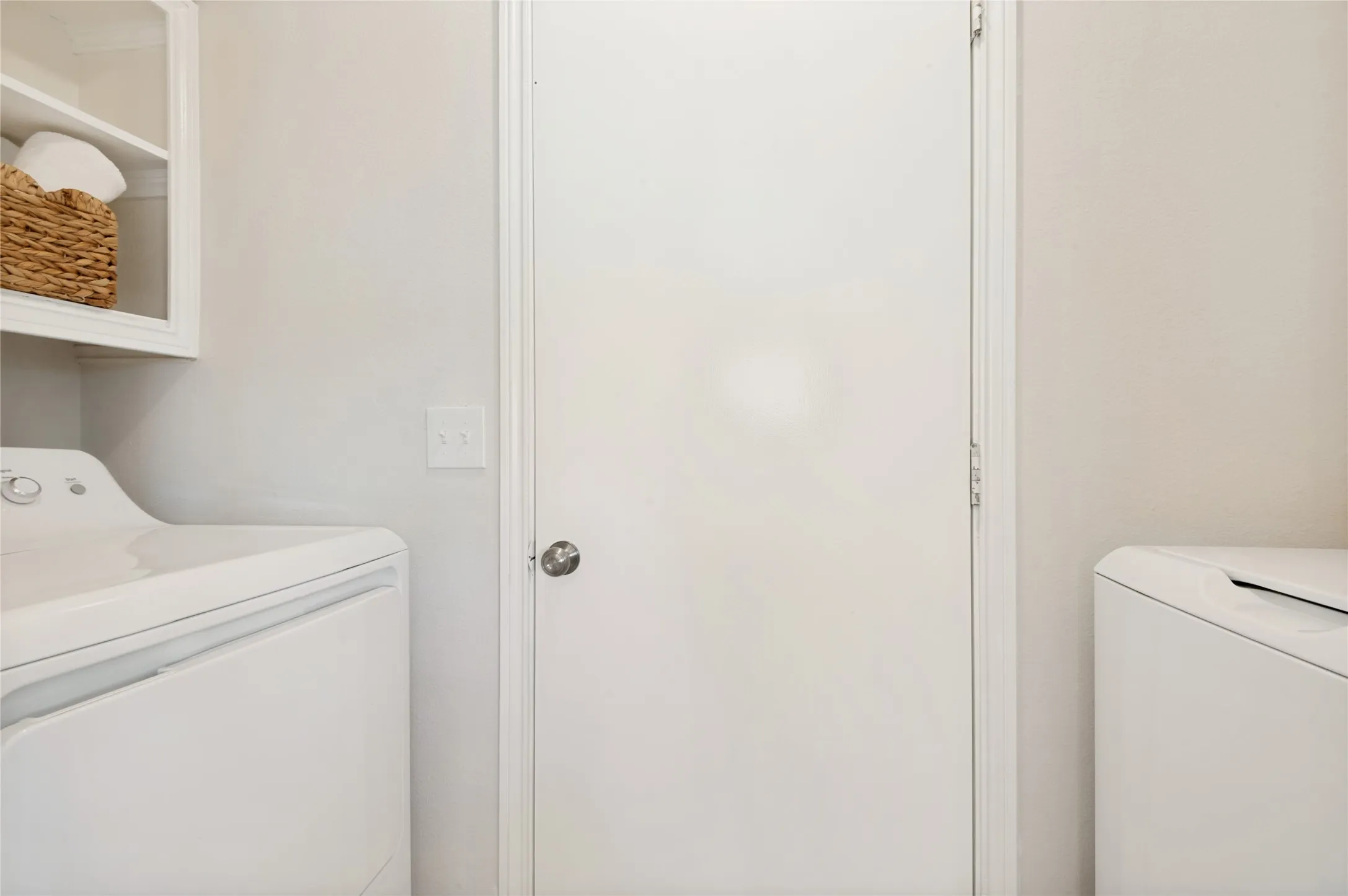 Designated Utility Room equipped with over-appliance storage, access to the garage and kitchen, and WASHER and DRYER included with reasonable offer