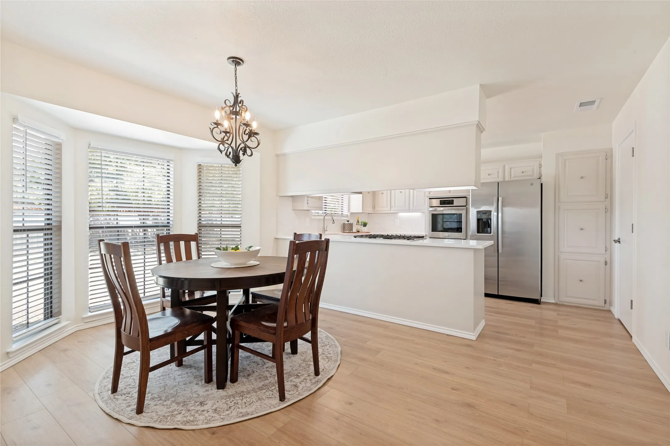 Chef's Kitchen!  2 separate pantries, storage galore, gas stove and oven, stainless steel refrigerator, new granite countertops, new kitchen sink, faucet, and lighting - all GFCI