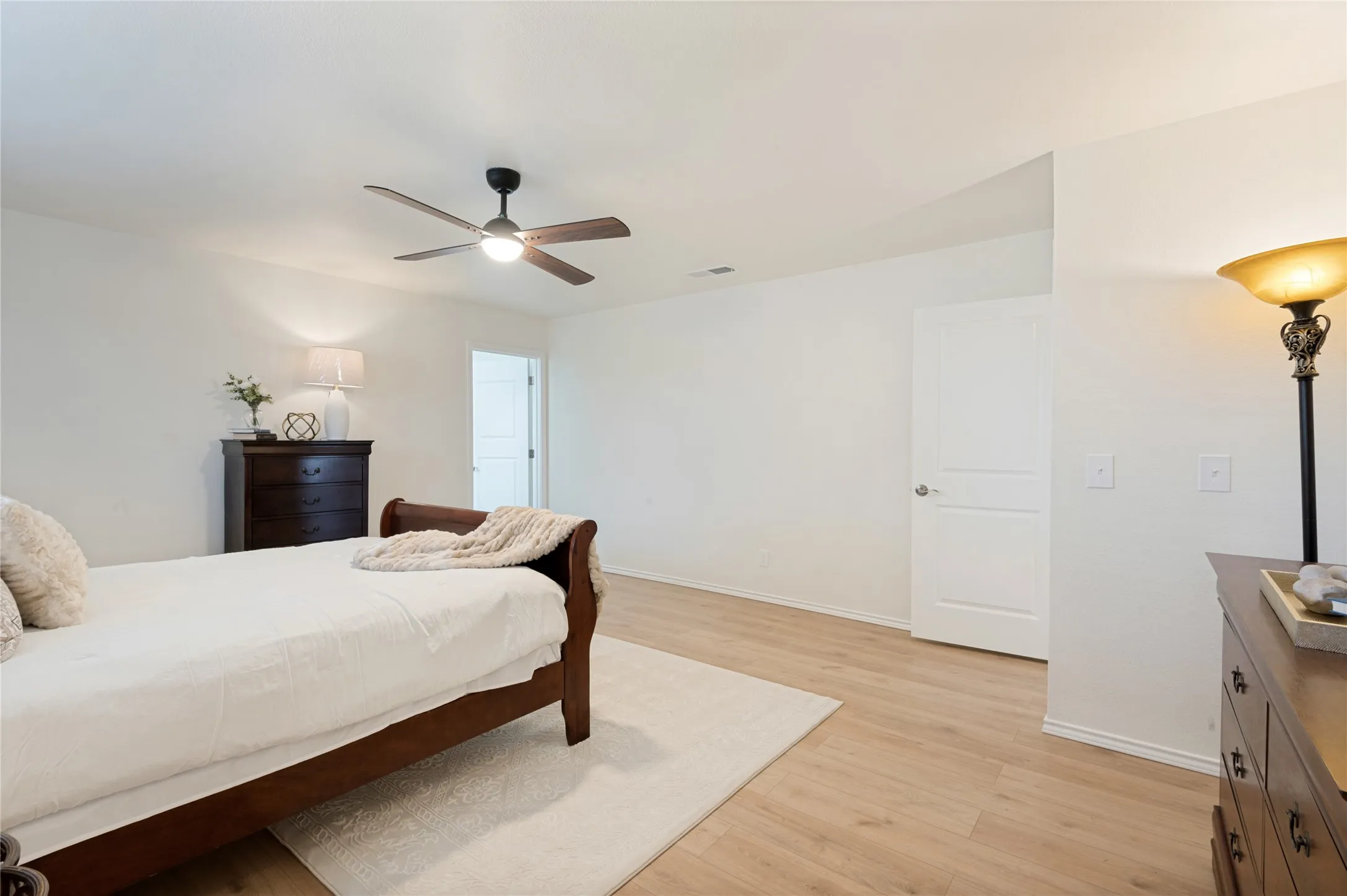 Primary Bedroom Ensuite - large enough for a seating area and 3 WALK-IN CLOSETS!!
