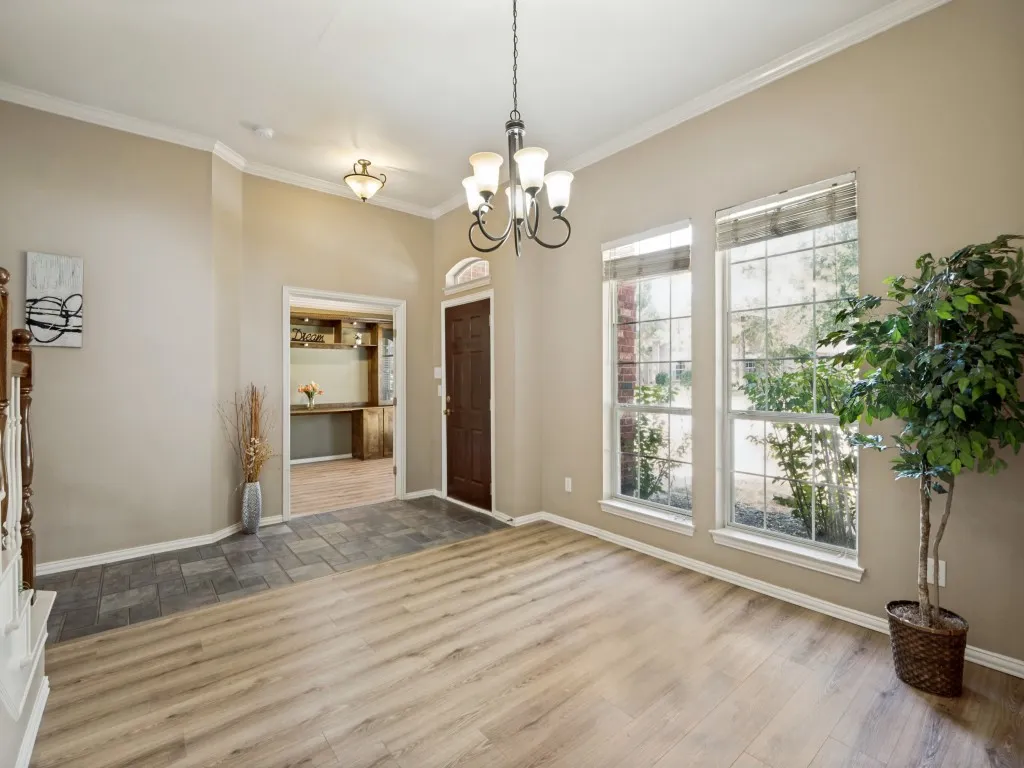 Foyer area with office on right and formal dining on left when you enter