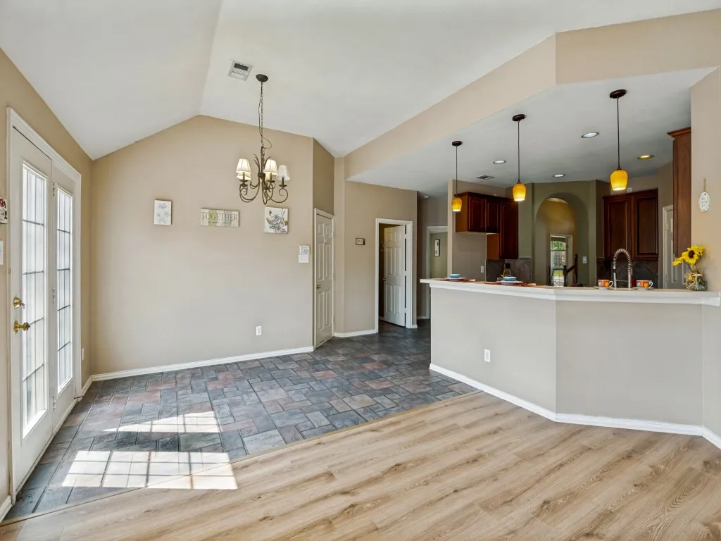 Large breakfast area next to door to garage, laundry room