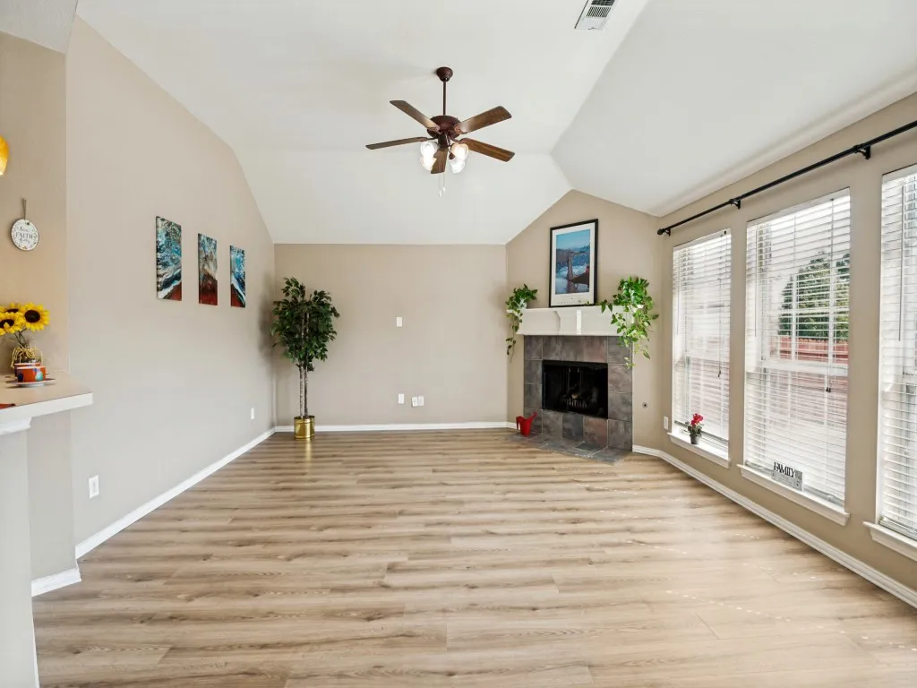 Another view point of family room with fireplace