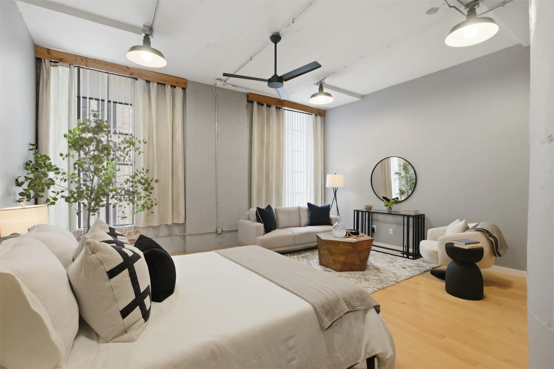 Great Room staged as bedroom & Living area