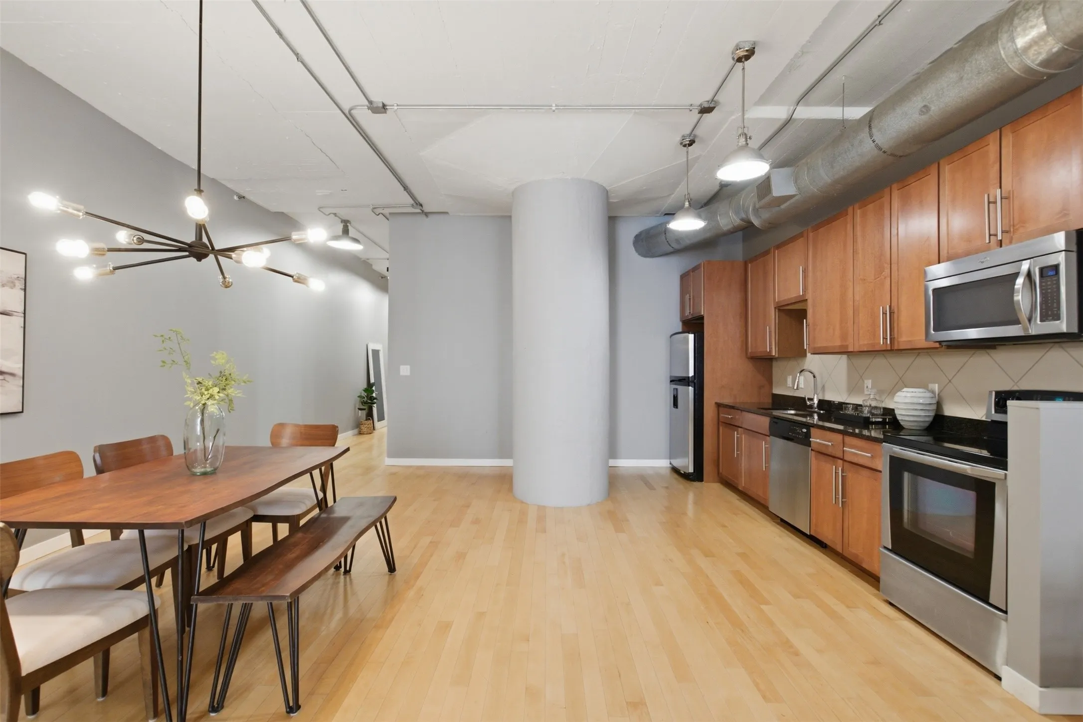 Kitchen and dining areas of the studio.