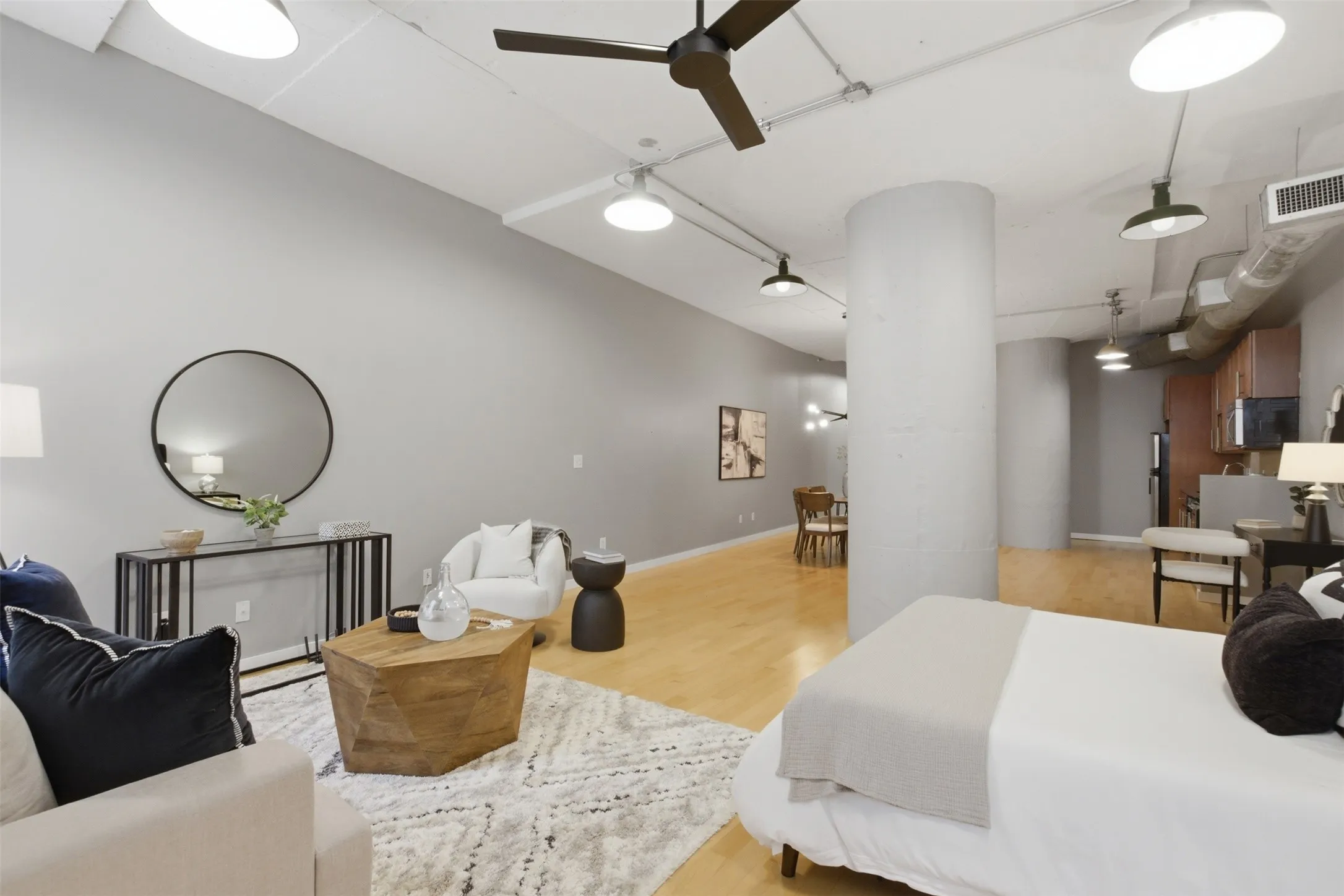 Great Room staged as bedroom & Living area
