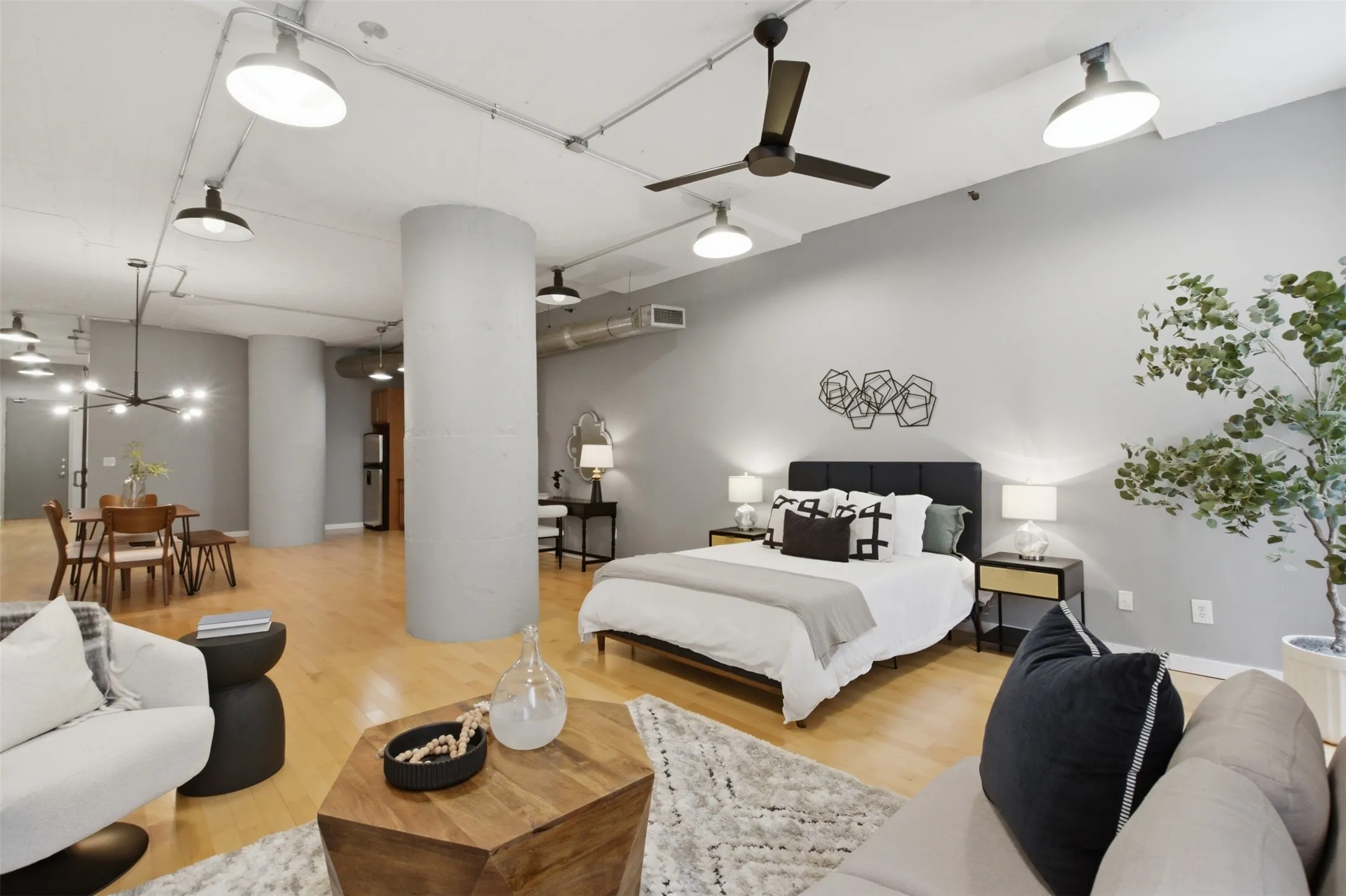 Great Room staged as bedroom & Living area