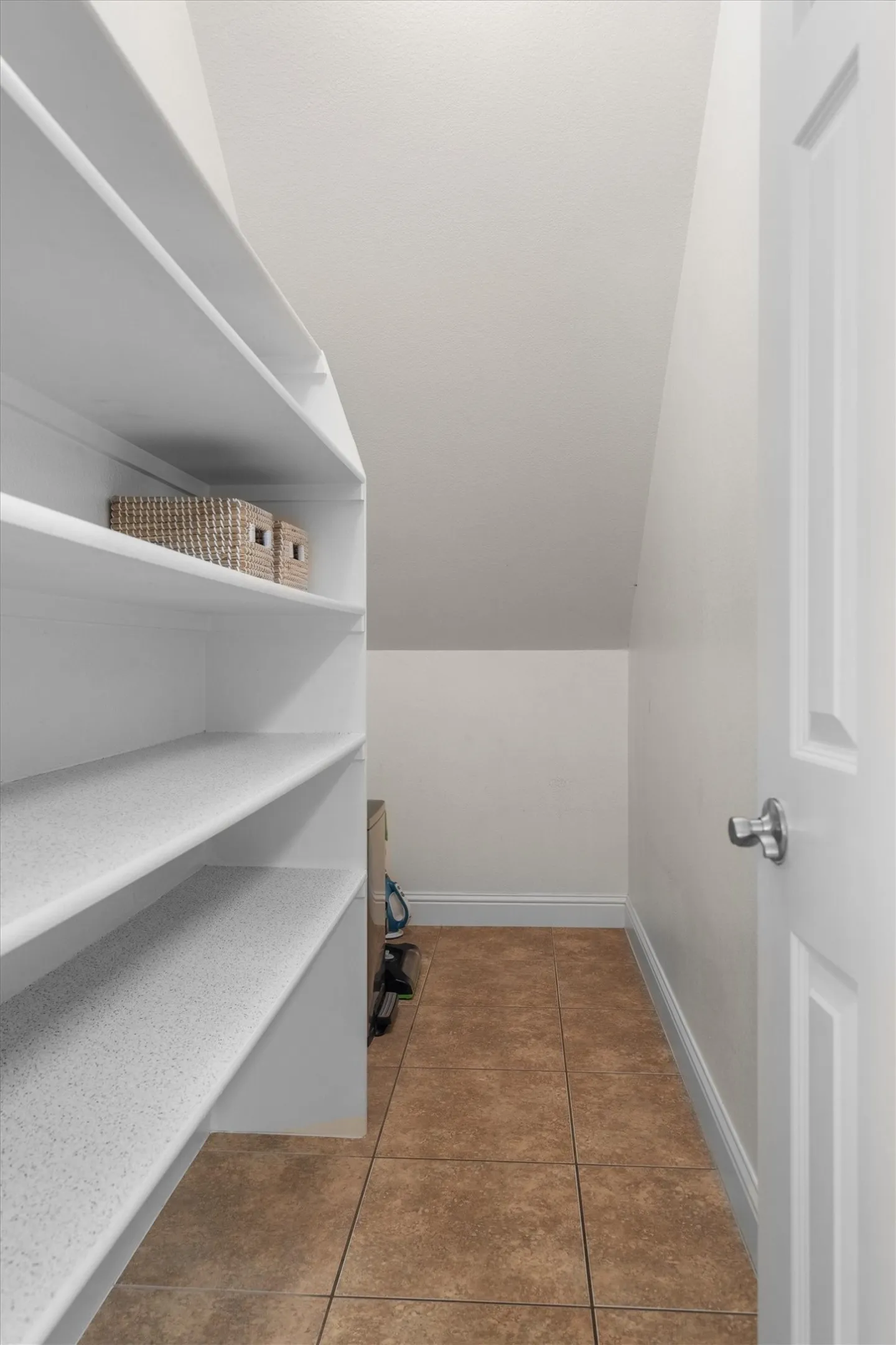 Custom built-in shelving offering smart, functional storage