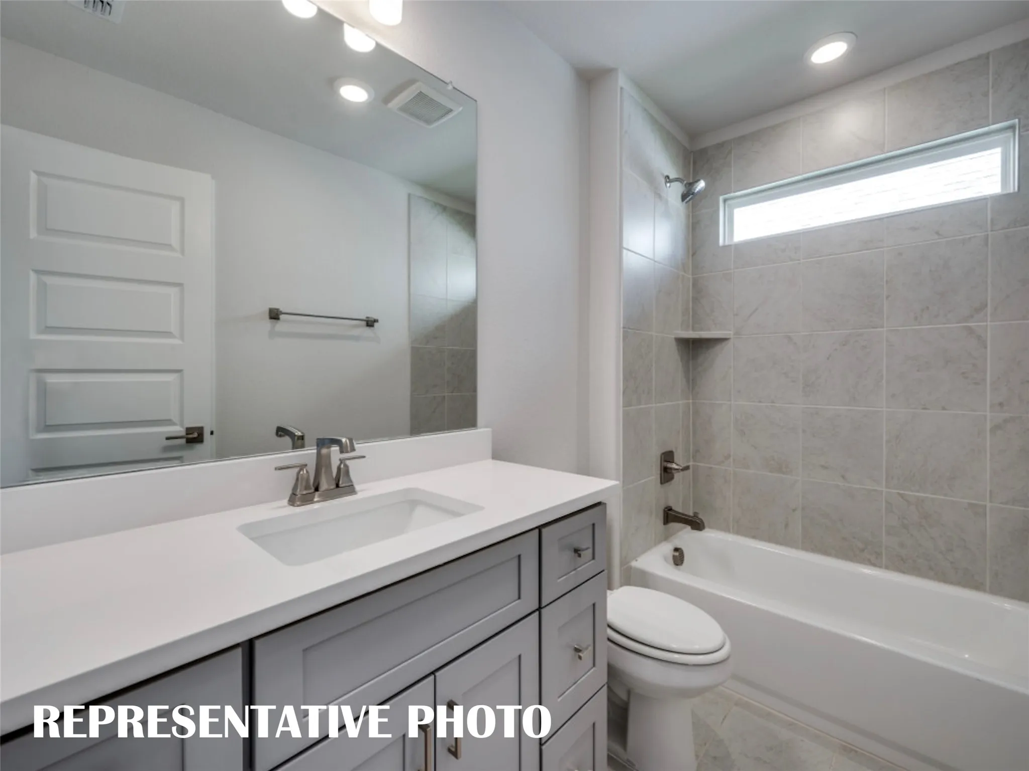Friends and family will feel right at home in either of the guest baths in this dream home!  REPRESENTATIVE PHOTO
