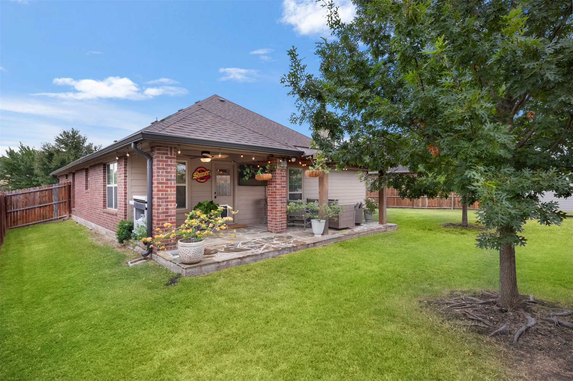 The extended covered patio opens directly to the backyard, giving buyers plenty of room to relax, entertain and enjoy the outdoors.