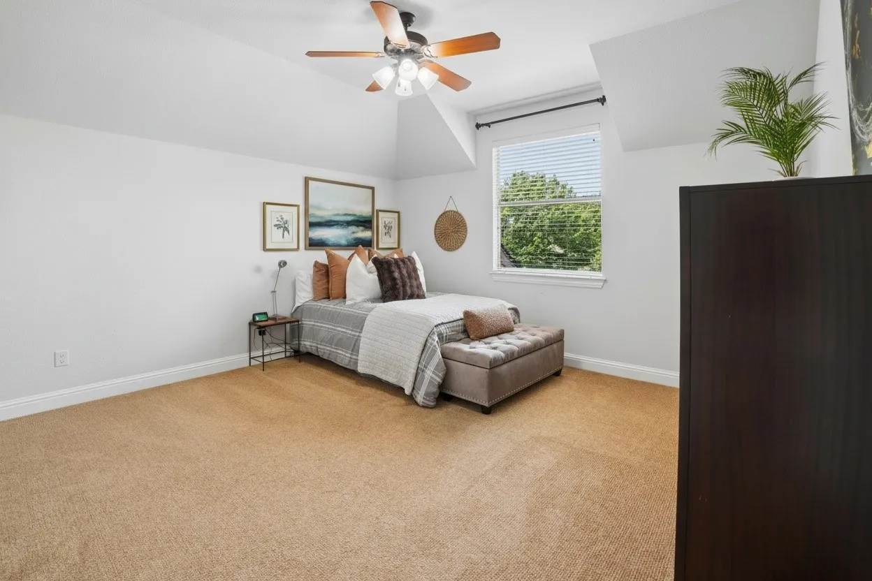Spacious upstairs secondary bedroom 4 offers flexibility for family, guests or additional workspace.