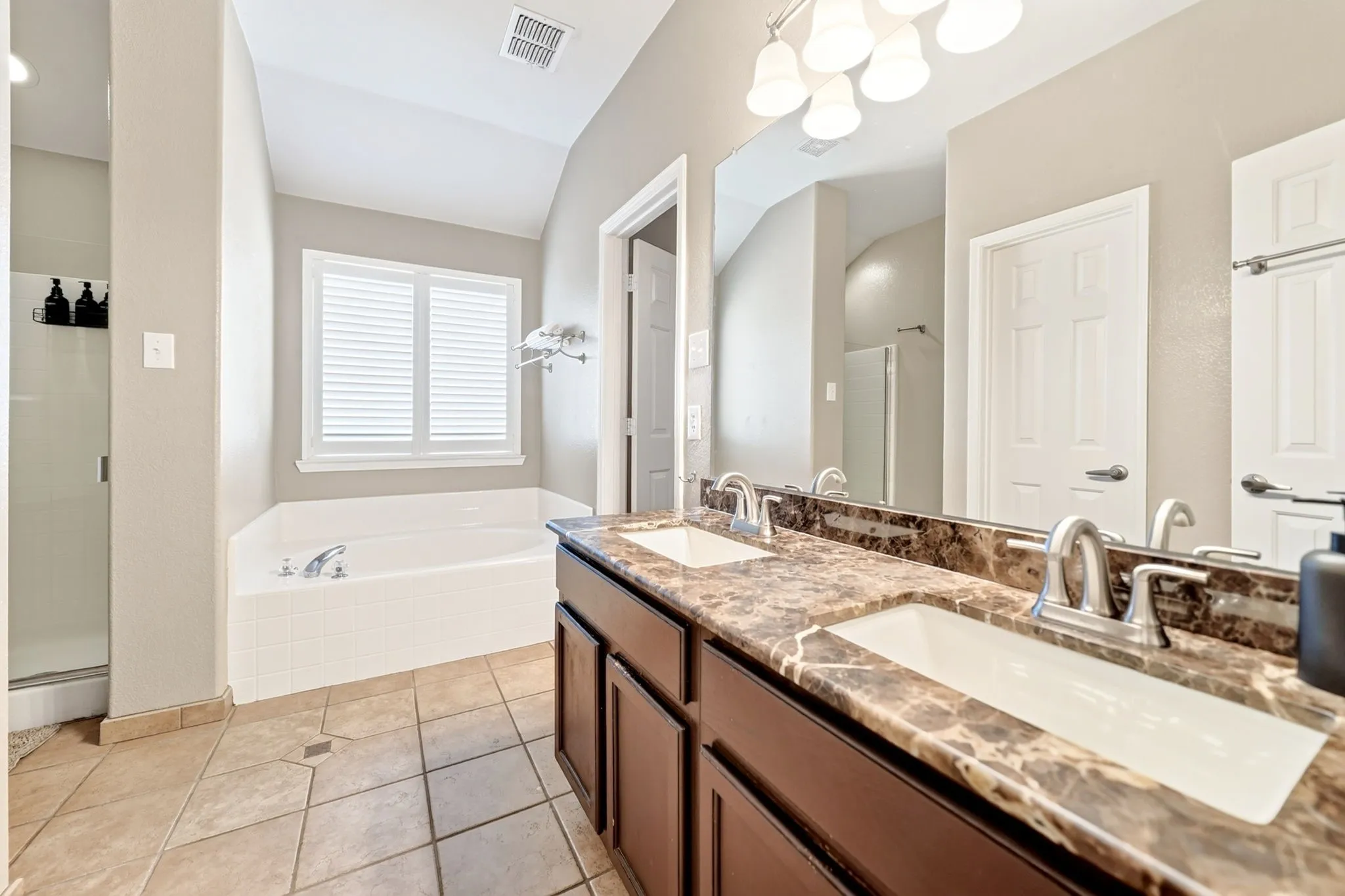 Dual vanity with integral sinks and a patterned countertop