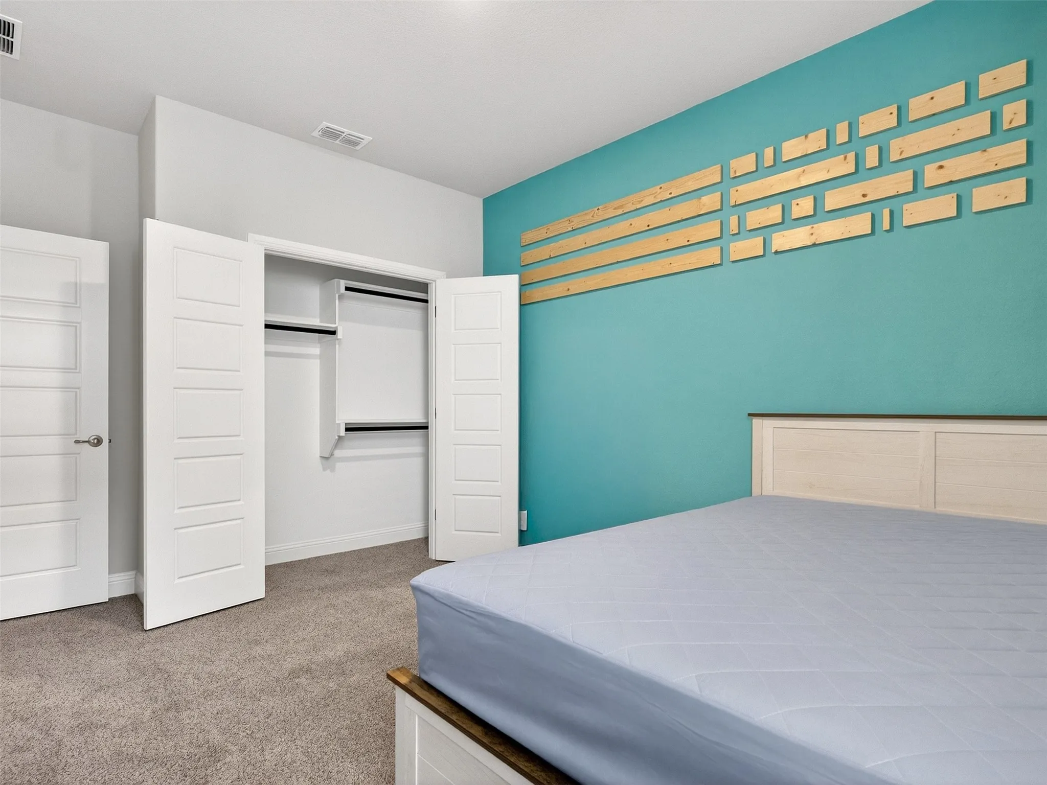 Built-in closet with double hanging rods and shelving
