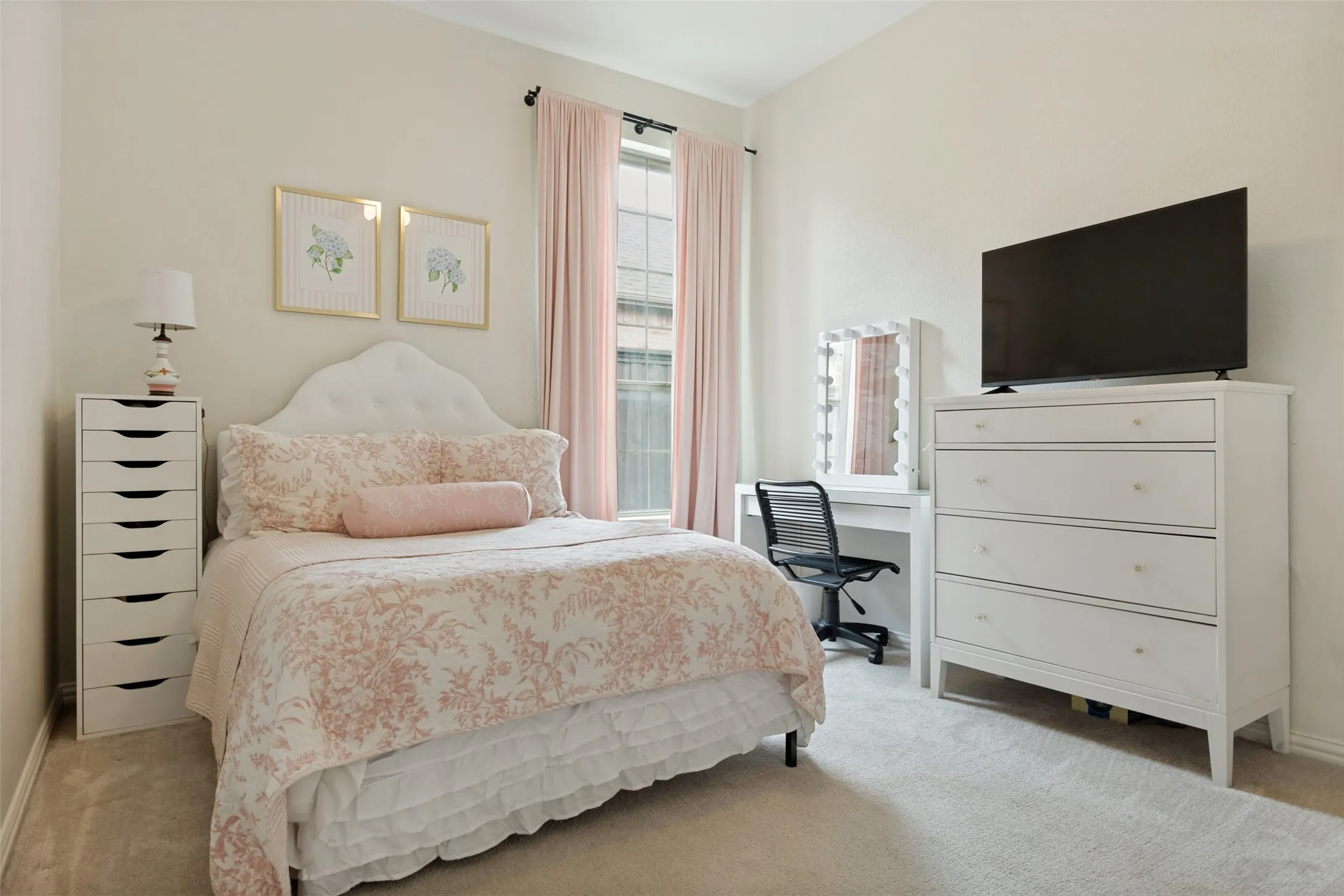 Plush carpeting, window with drapery rod, and light-toned wall paint