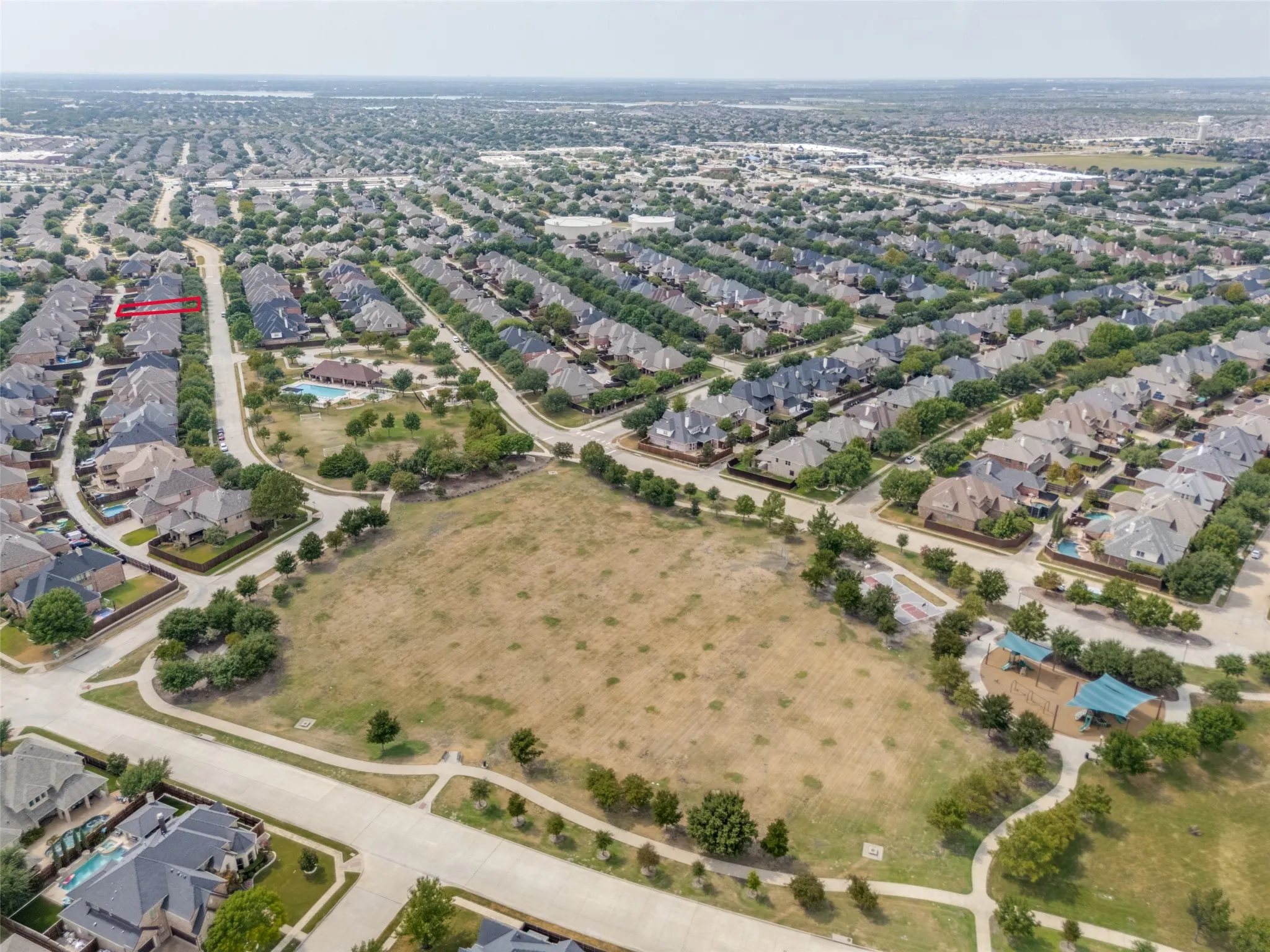 Aerial perspective of a developed residential area with numerous single-family homes