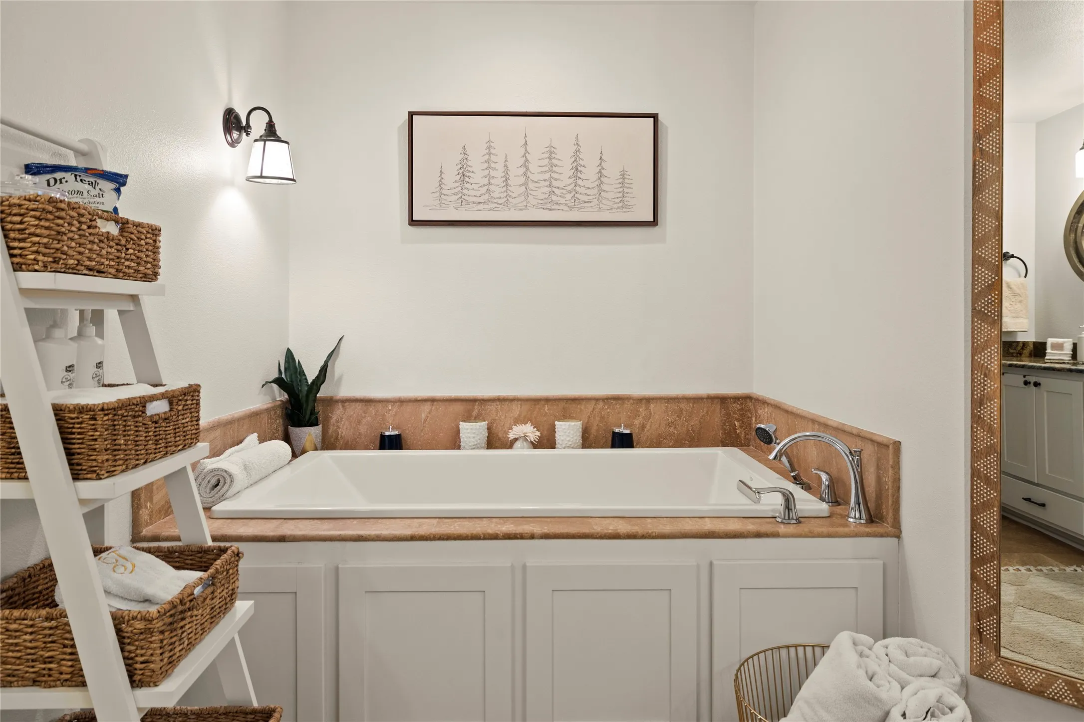 Soak in the deep primary bathtub or use the separate shower.  A tranquil space to relax after a fun-filled day outdoors.