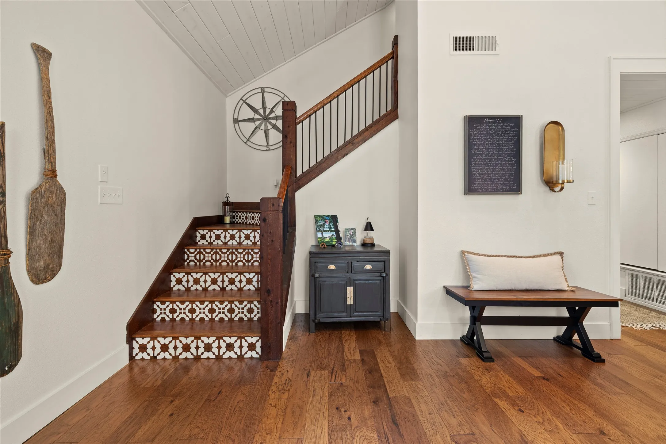 No carpet in this residence!  Love the detail on the staircase leading to the loft bedroom. Many notable upgrades & recent updates not to miss---metal roofs, new HVACs & water heaters, a 20kw generator, full backyard sod & expanded sprinkler system, larger aerobic septic system added in 2022, basketball court by the garage..........and so much more!